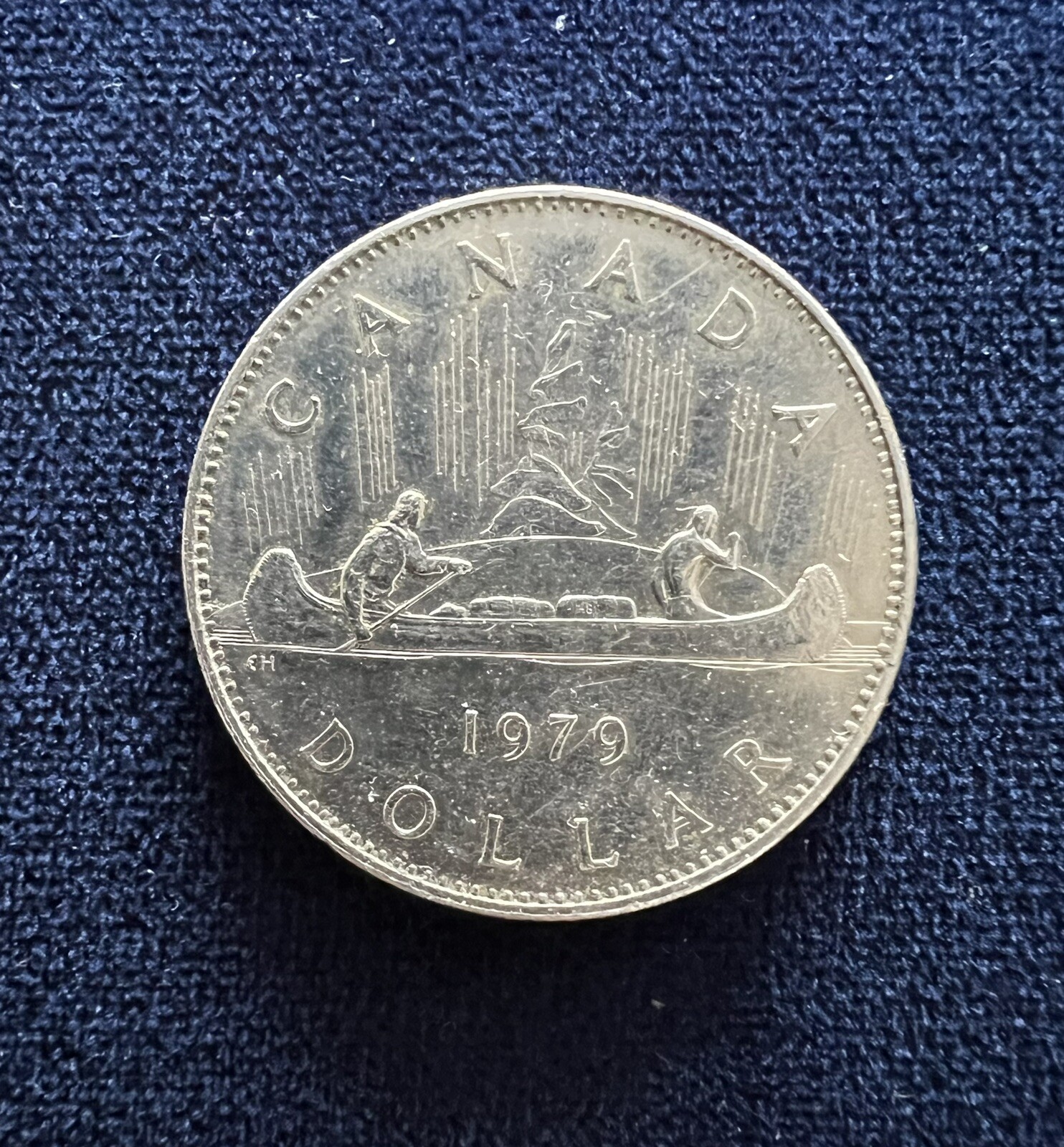 1979 ONE DOLLAR SILVER COIN OF CANADA. QUEEN ELIZABETH II. V.F.