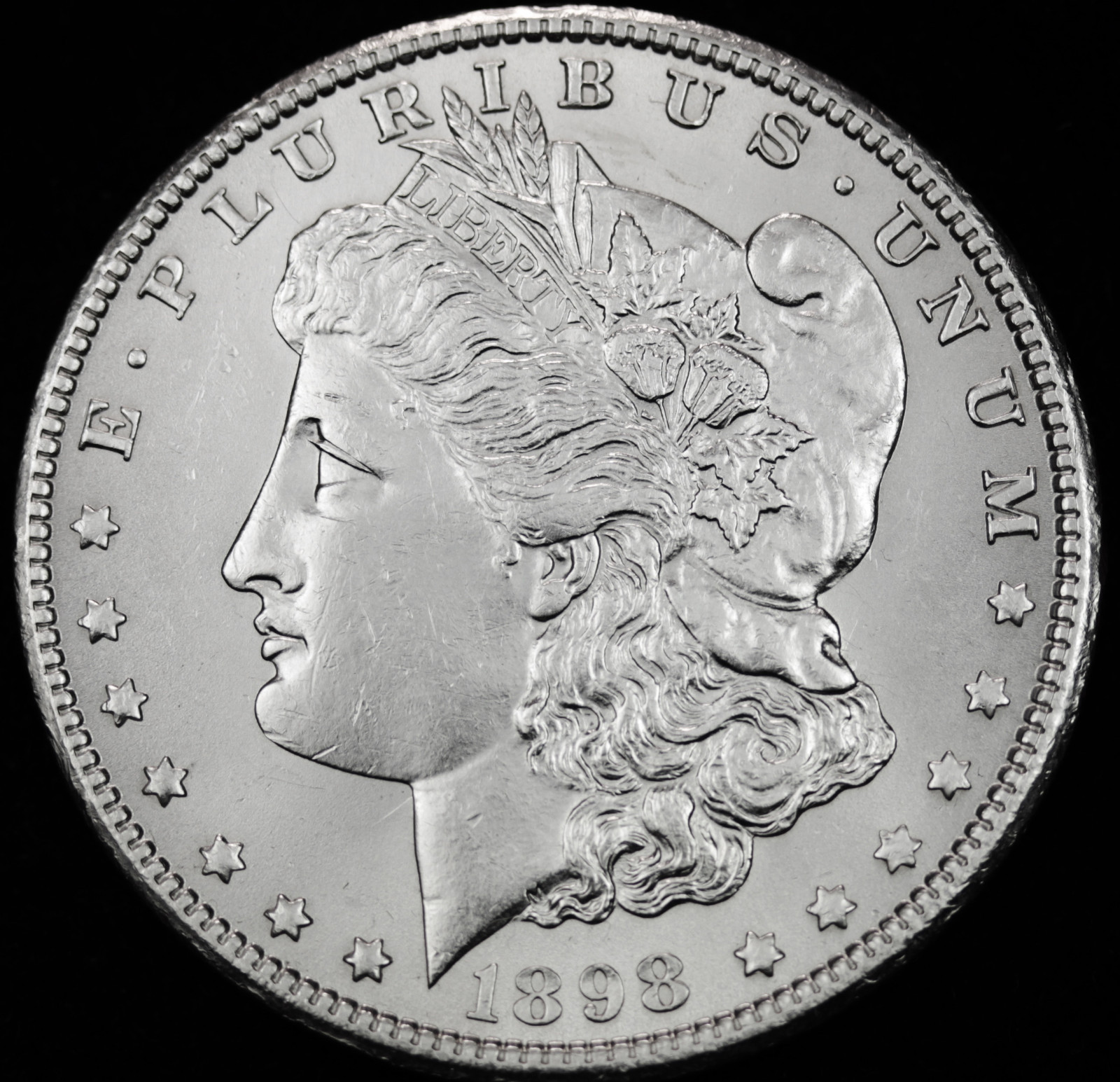 1898-o Morgan Silver Dollar.   B.U.  65931 (Inventory A)