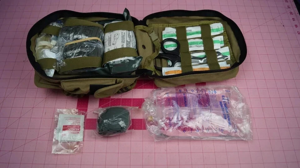 North American Rescue Combat Casualty Response Kit With Med Supplies See photos