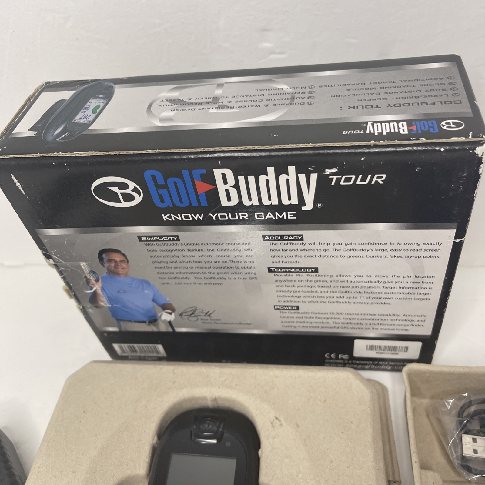 Golf Buddy Tour with Manuals, Belt Clip, Wall Charger, and USB charging cable.
