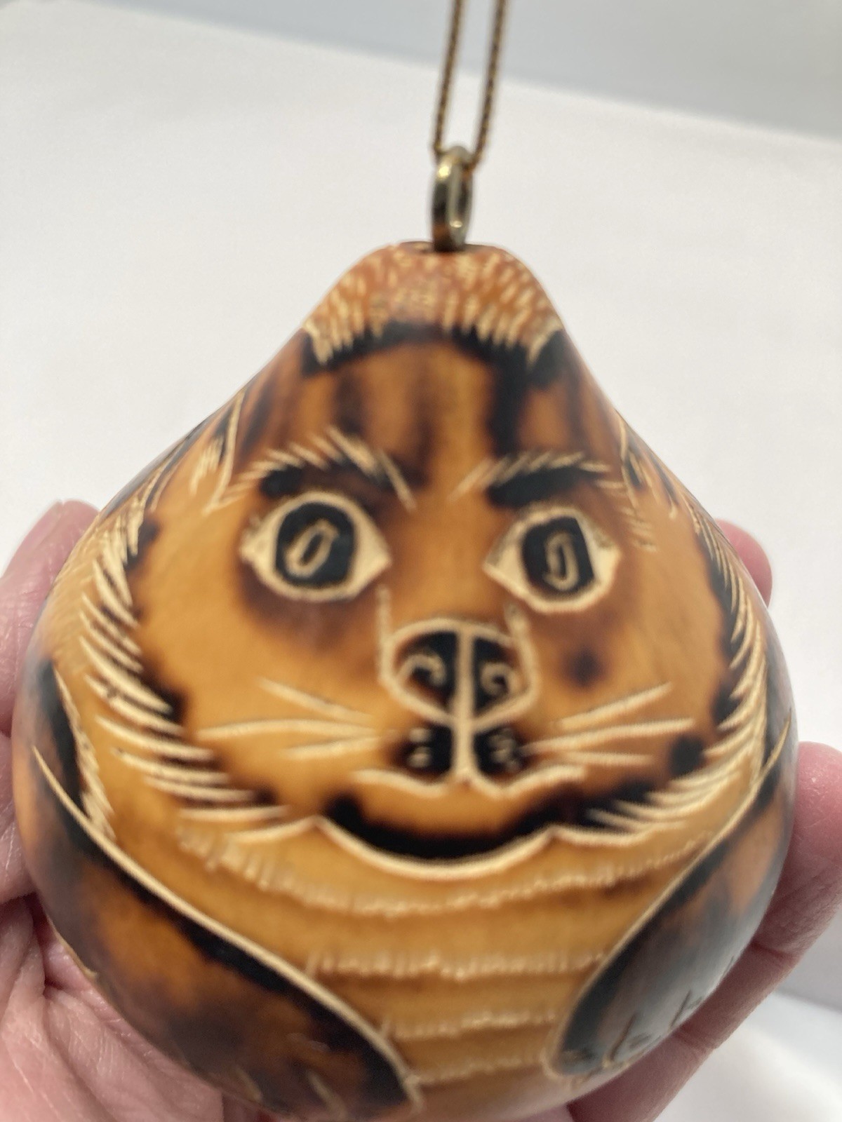 tiger/cat hand carved gourd ornament Peru