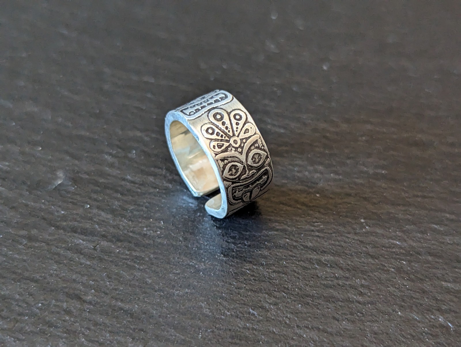 Thick sterling silver ring with tiki gods - handmade - open design