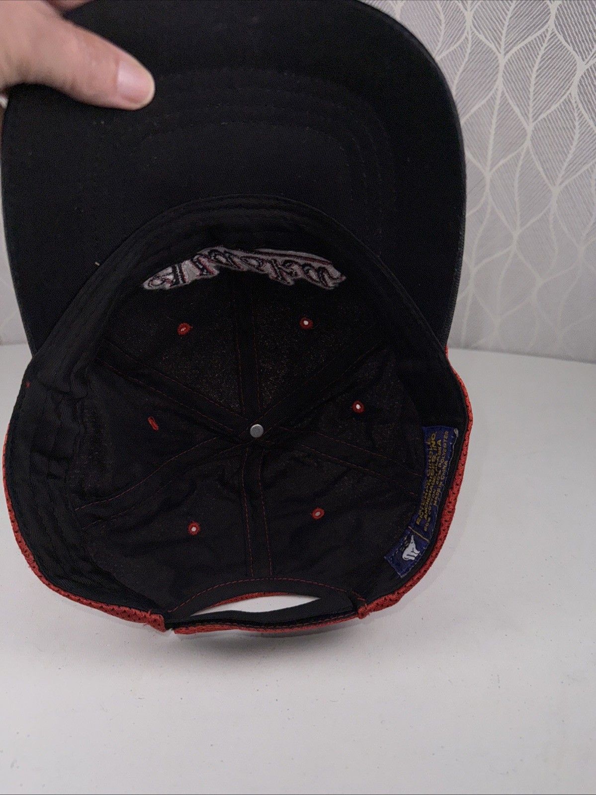 ALASKA in Script on Red w Black Accented Hat Cap Vented Fabric Hook Loop