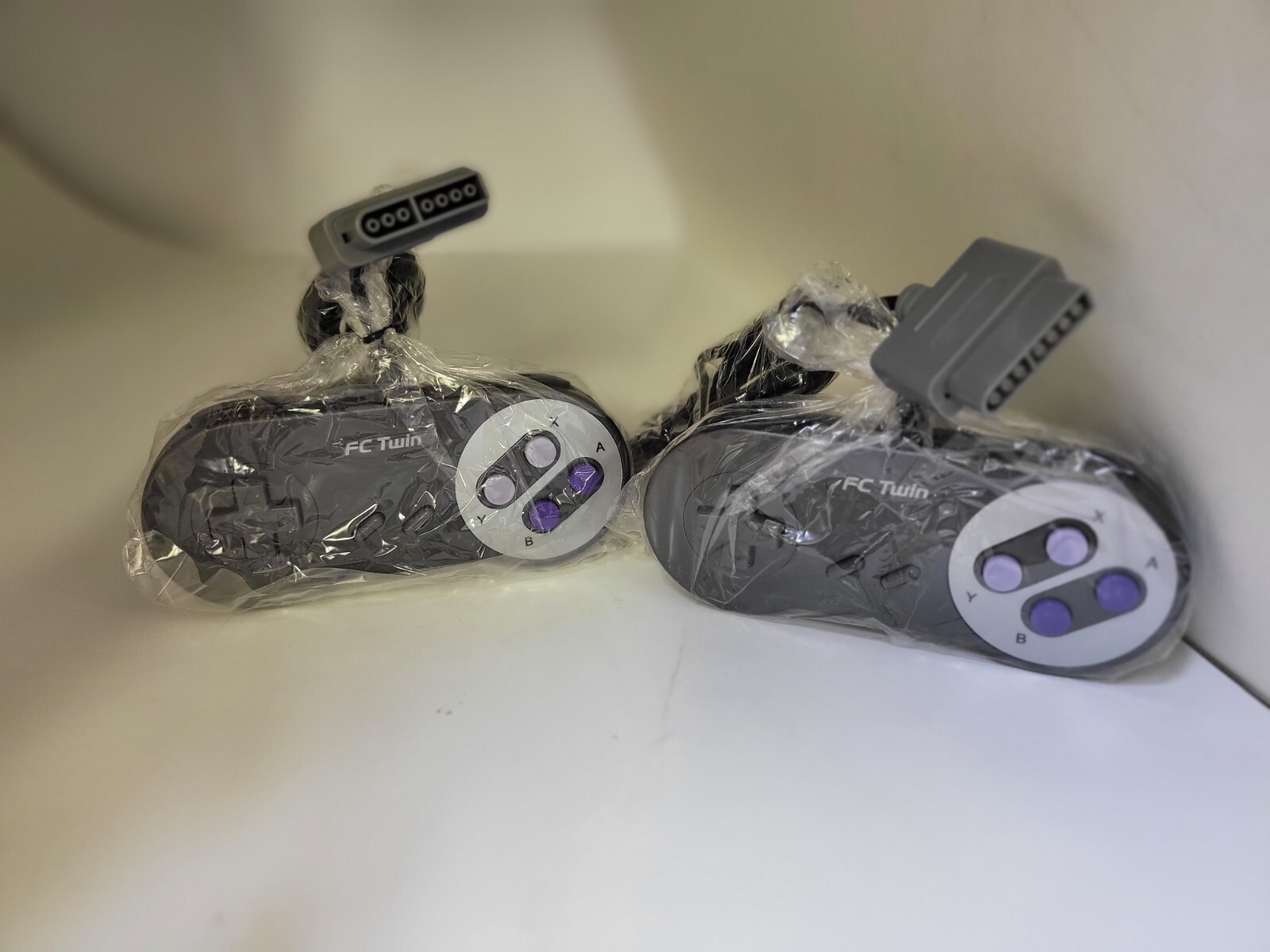 TWO (2) NEW BLACK FC TWIN FC2 or SNES CONTROLLERS CONTROL PADS OFFICIAL YOBO 18O