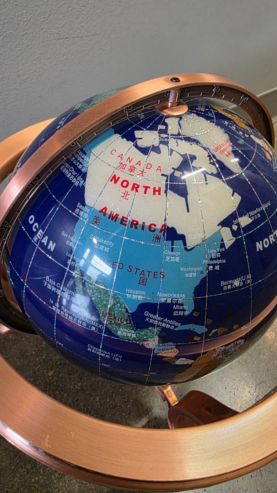 World Globe - Plastic Copper Rotating Base. From China