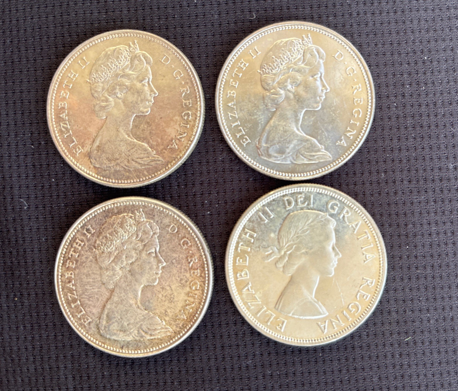 Lot of 4 Canadian Silver Dollars