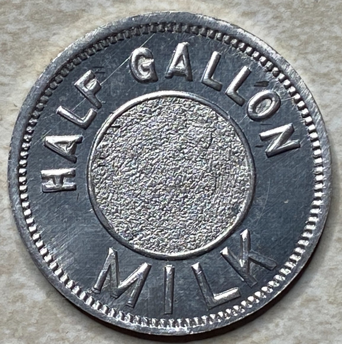 T9177 Half Gallon Milk, Unknown  Anillo Restrike Arcade Token