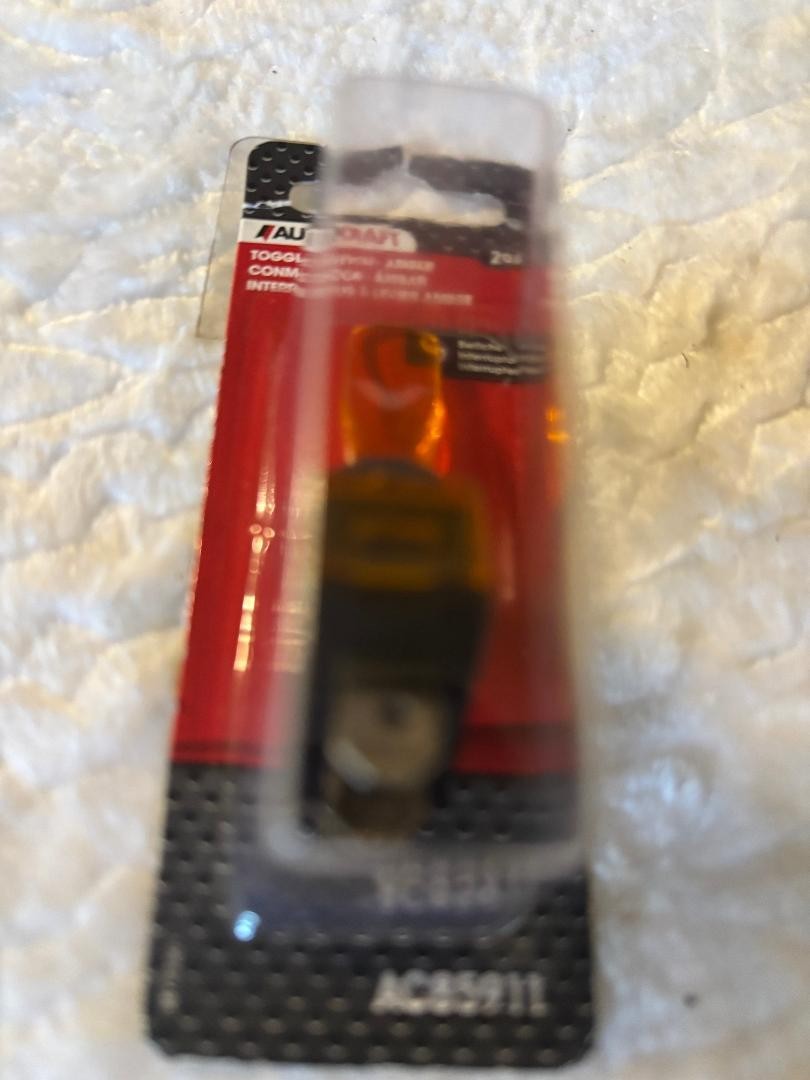AMBER TOGGLE SWITCH.  20 AMP