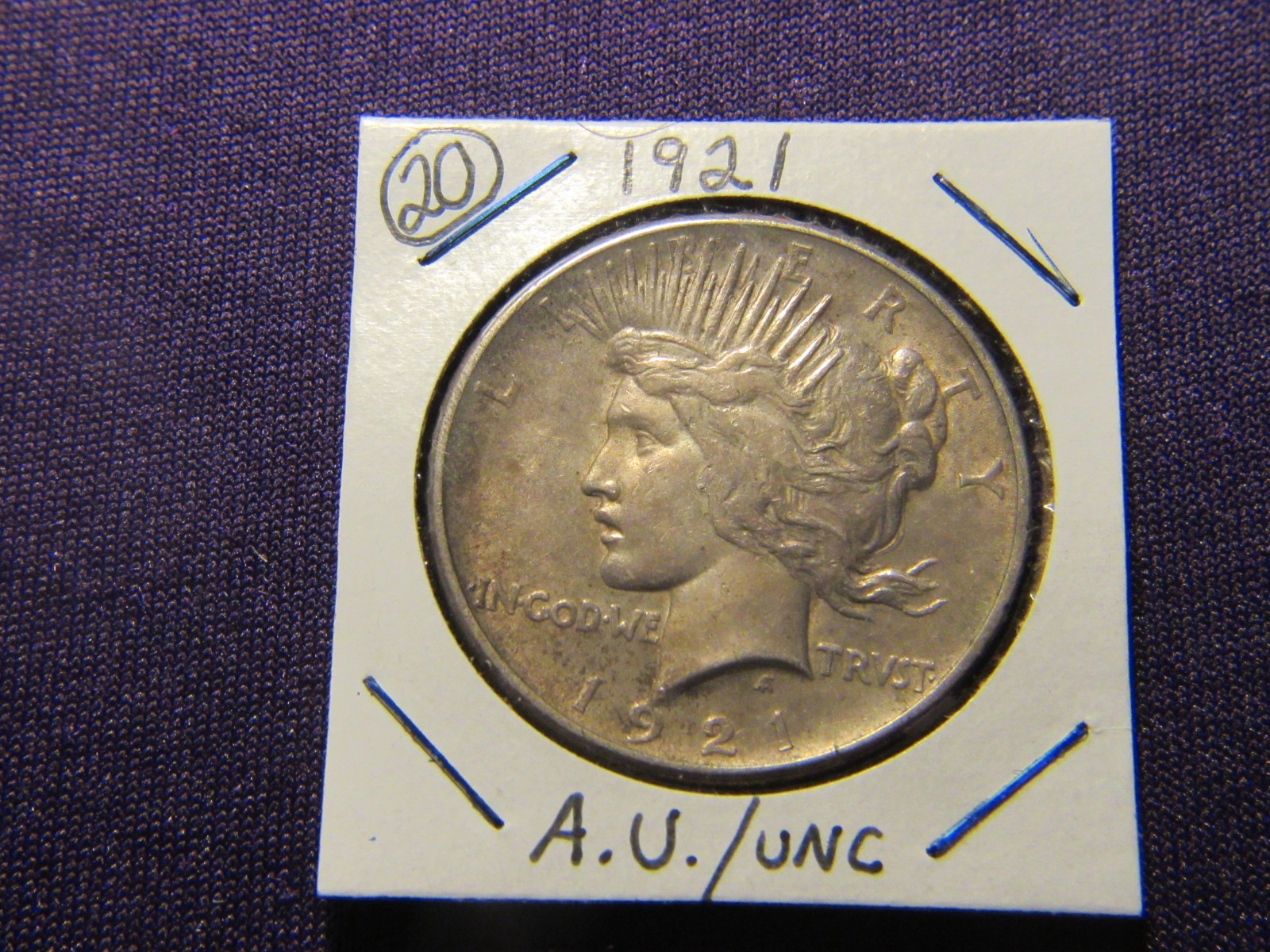 1921 Peace Silver Dollar in A.U. / UNC condition