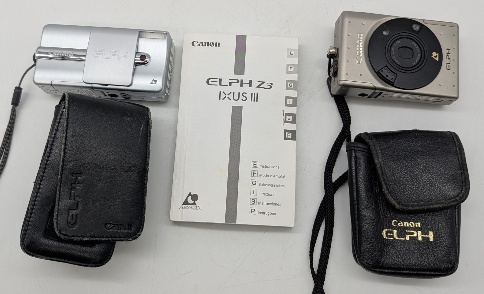 2 Canon ELPH Z3 Point & Shoot Film Cameras - Untested