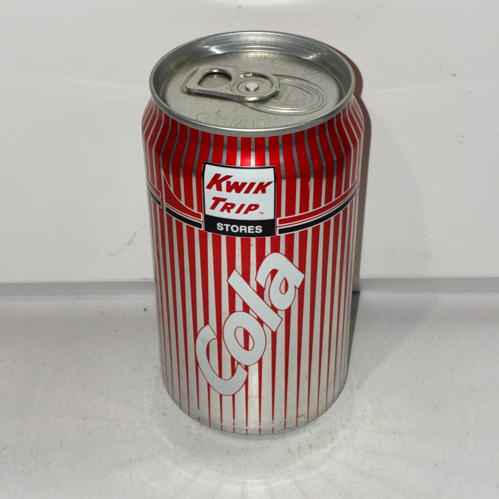 Kwik Trip Cola Soda can, bottom opened