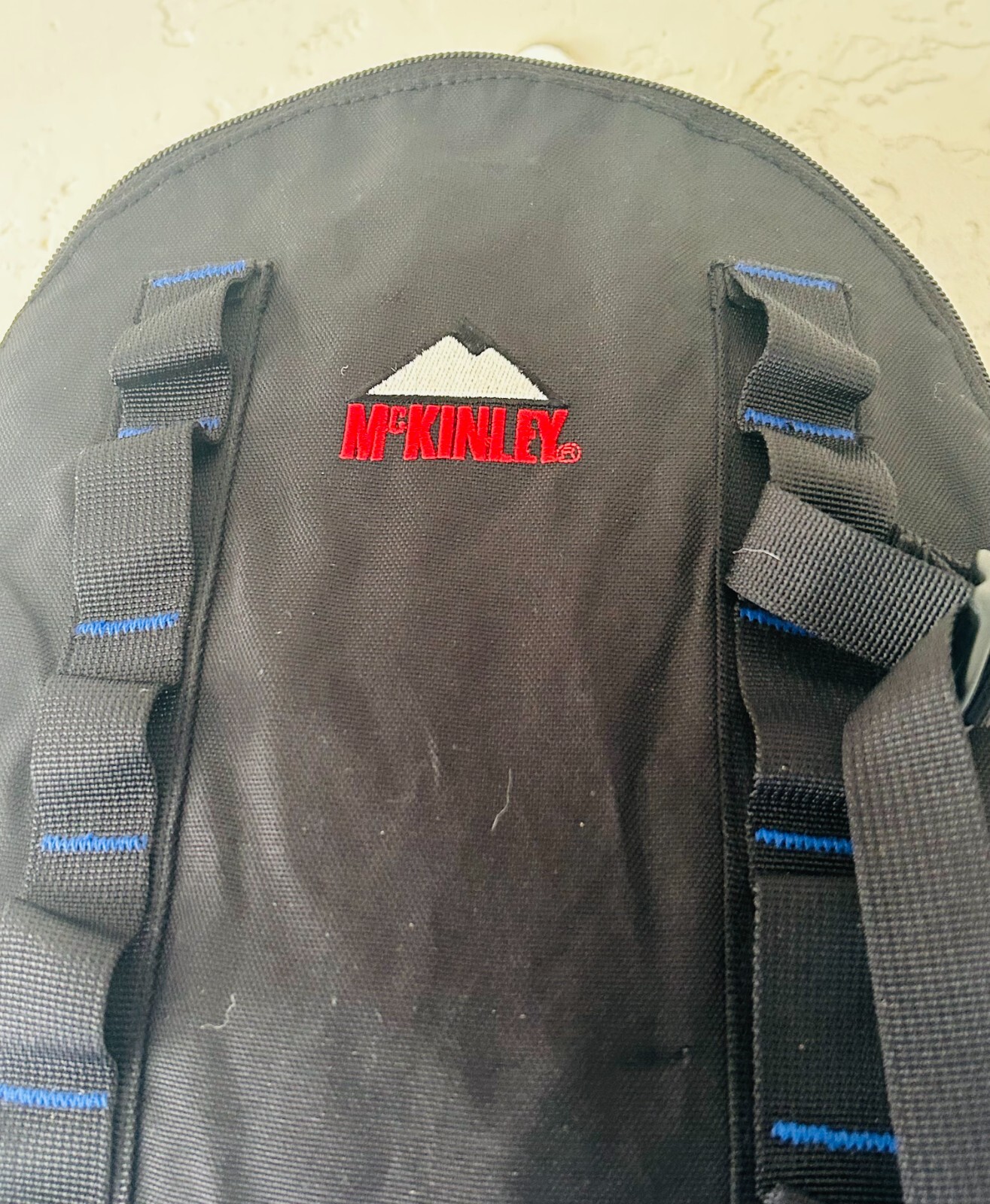 McKinley Hiking Camping Storm Control Backpack (Blue, Red and White)