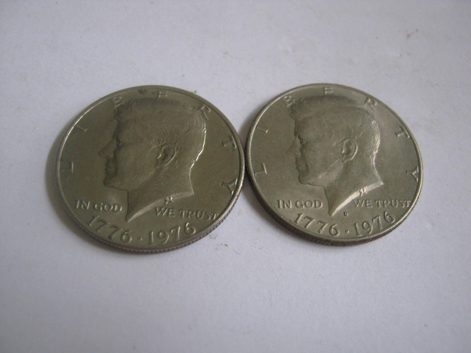 Pair of Nice 1776-1976 P & D Kennedy Halves