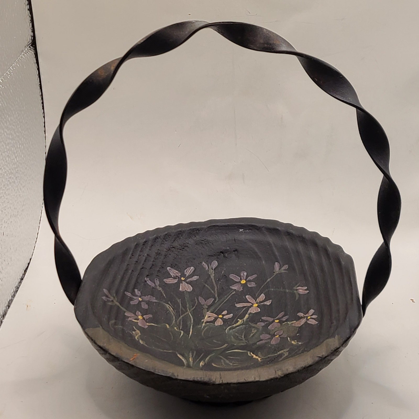 Basket in wood with metal handle. Hand carved w purple flowers. Signed. Mexican