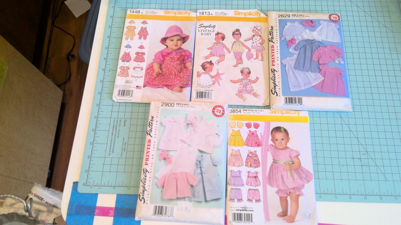 SIMPLICITY BABY PATTERNS -  1448, 1813, 2629, 2900 & 3854