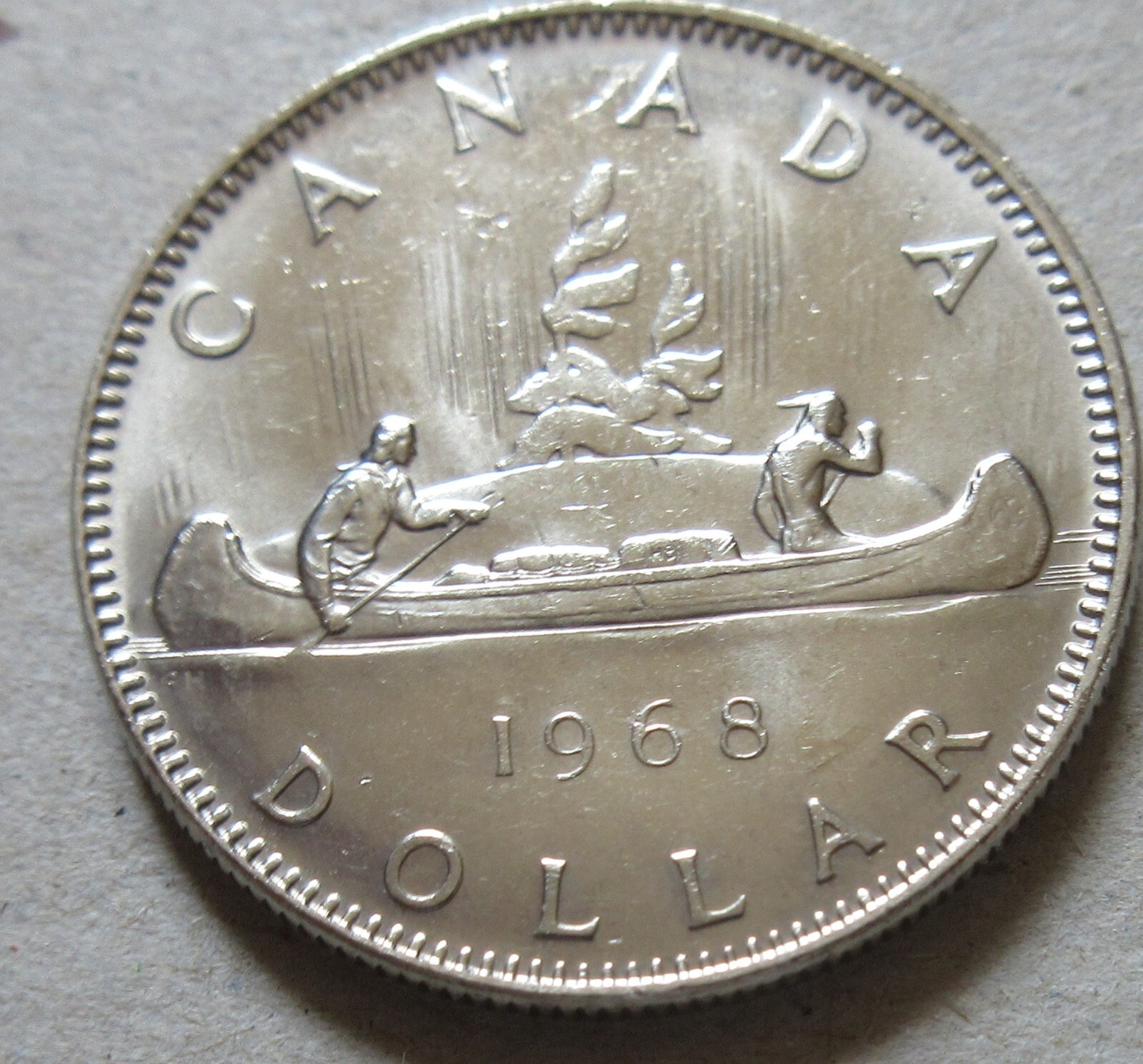 1968 Canada Canoe NO ISLAND Nickel Dollar Coin. Canadian $1 Dollar Voyageur