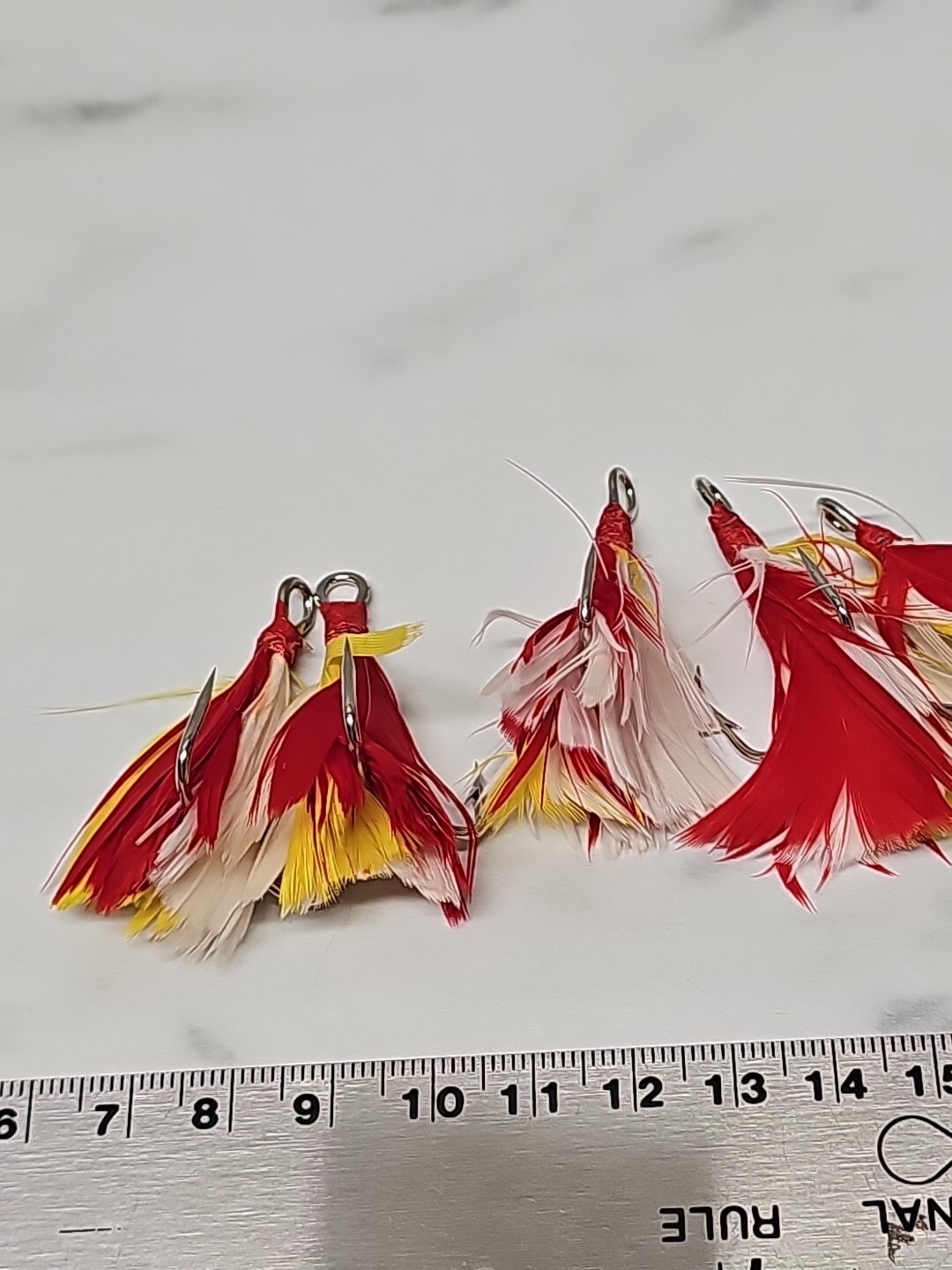 6 Dressed Treble Hooks with Yellow and Red Feather * Hook size #2/0*
