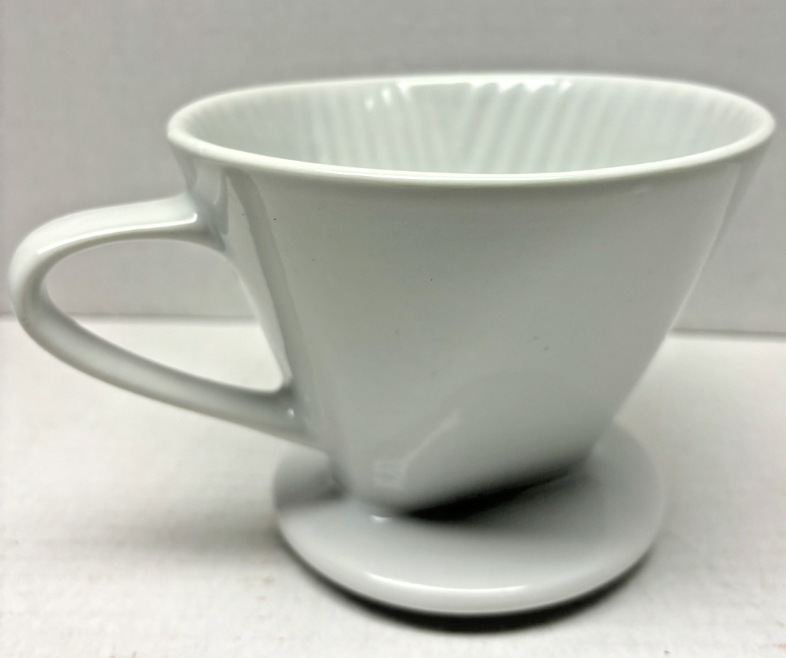 White pour over Porcelain Coffee filter. Great used condition.