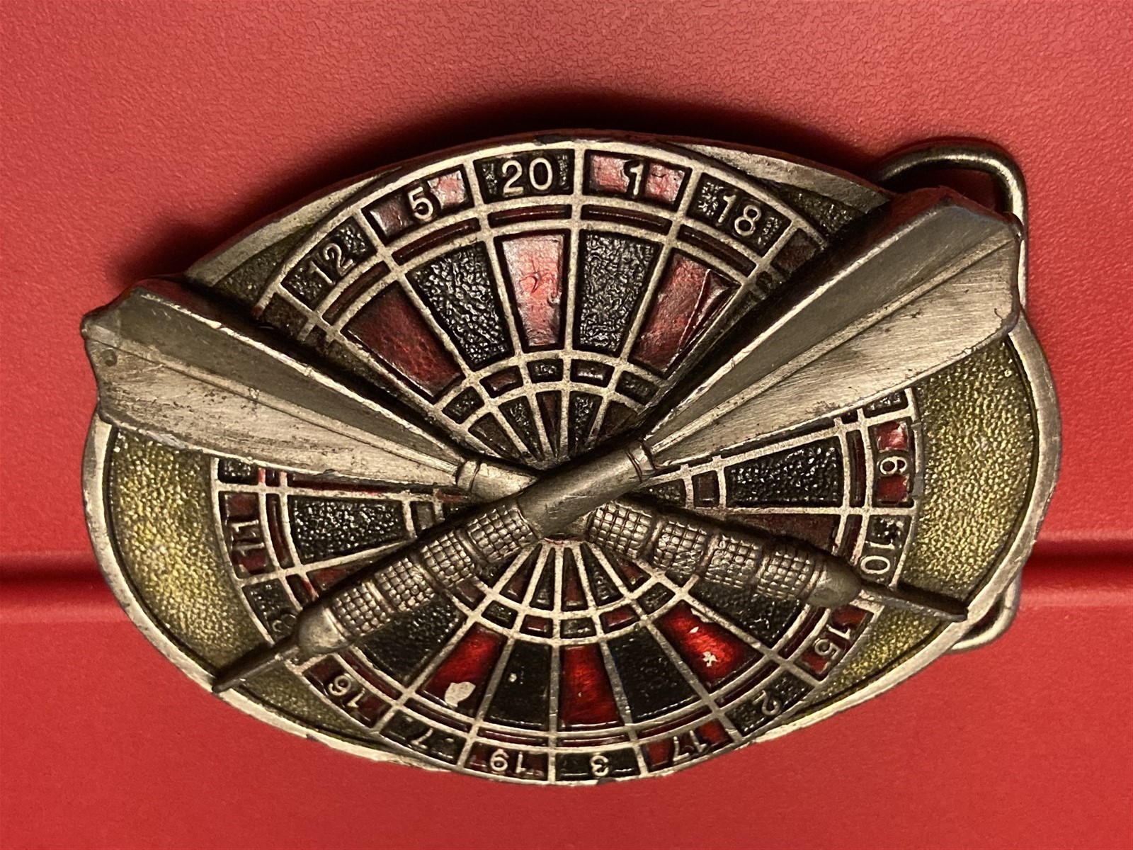 1984 Bergamot Brass Works belt buckle, dart board game