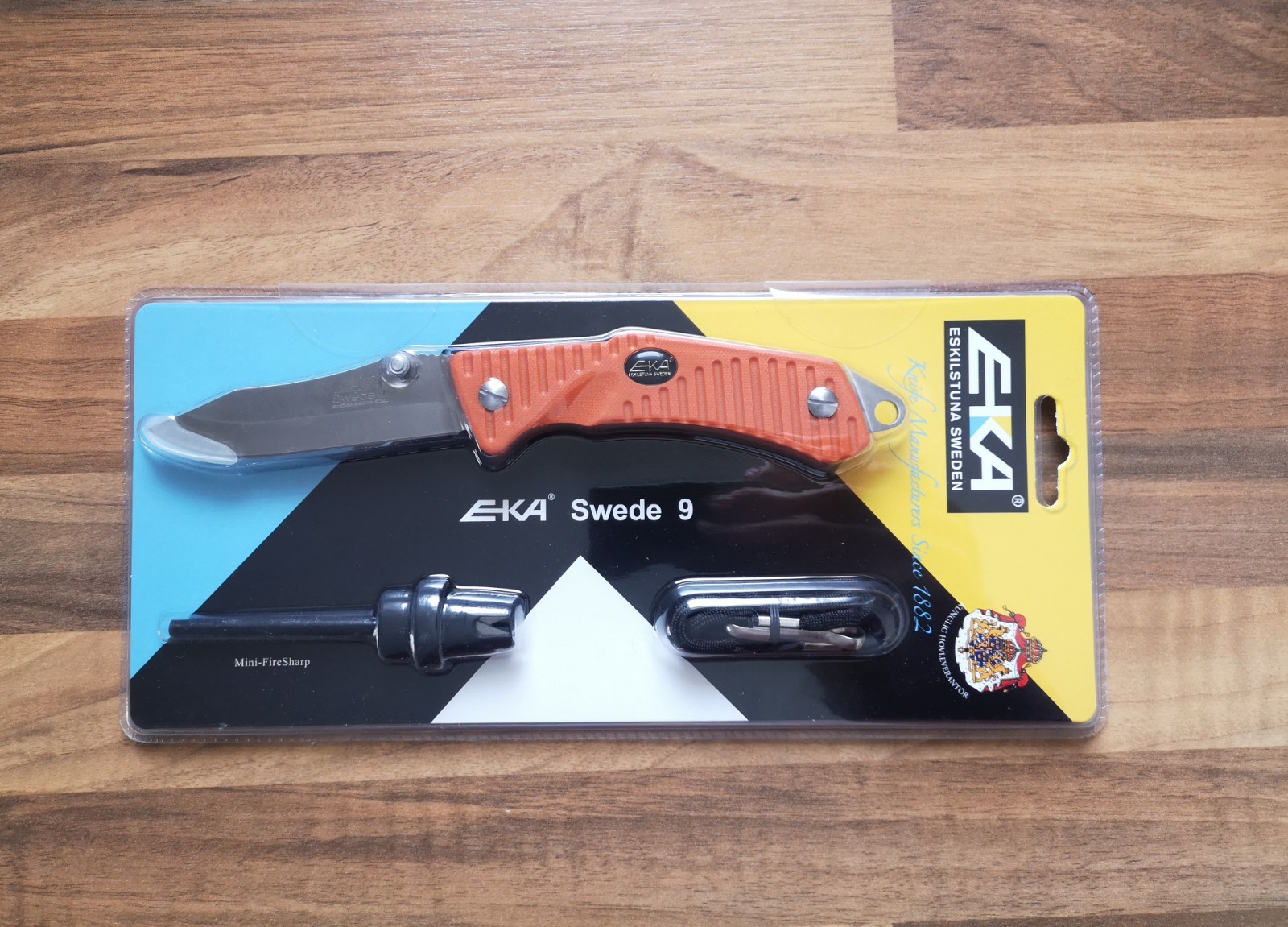 🇸🇪 EKA Swede 9 Orange inc Fire Steel / Knife Sharpener / Hunting Knife 12C27 / G10
