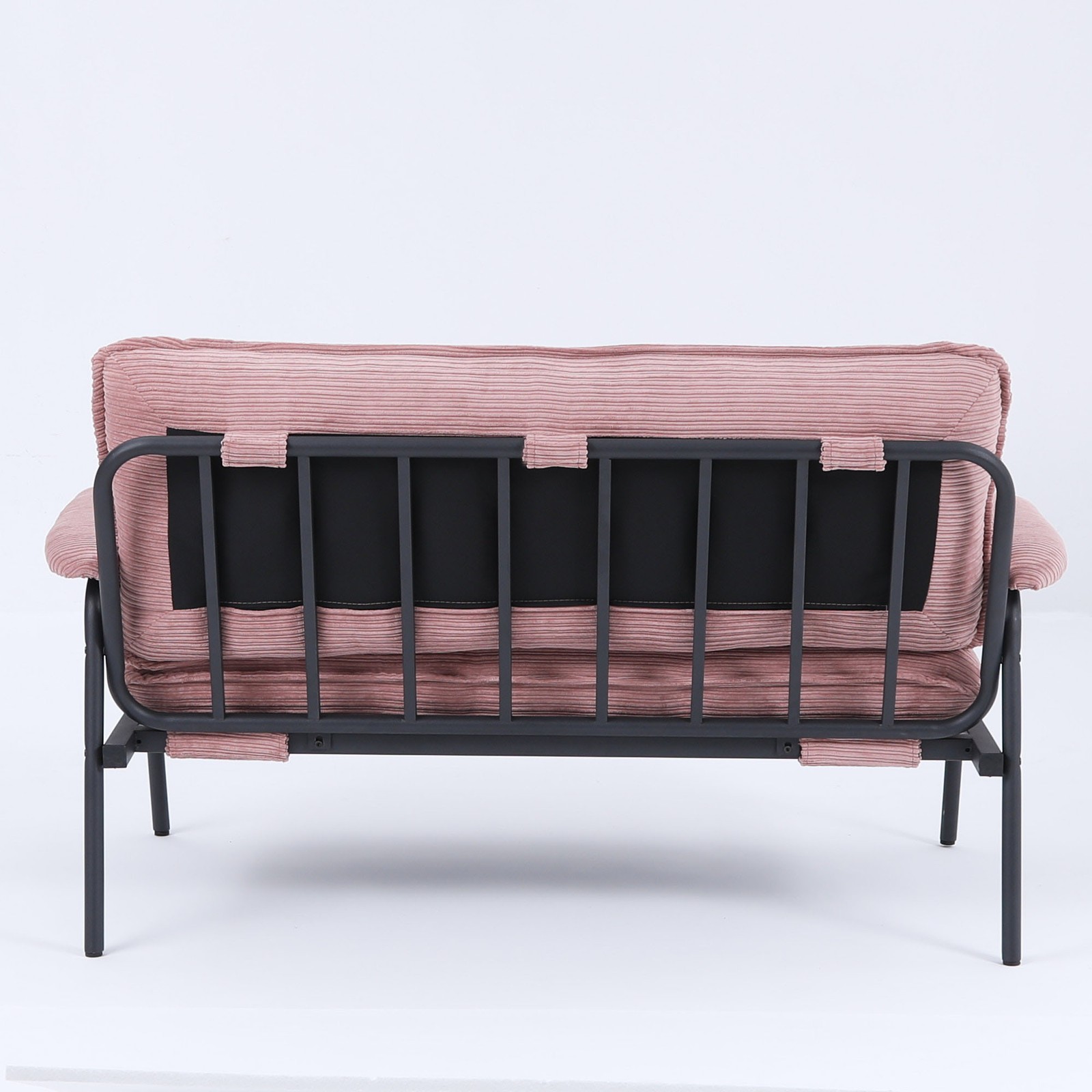 The 53-inch pink sofa offers a spacious layout in the small apartment, easily