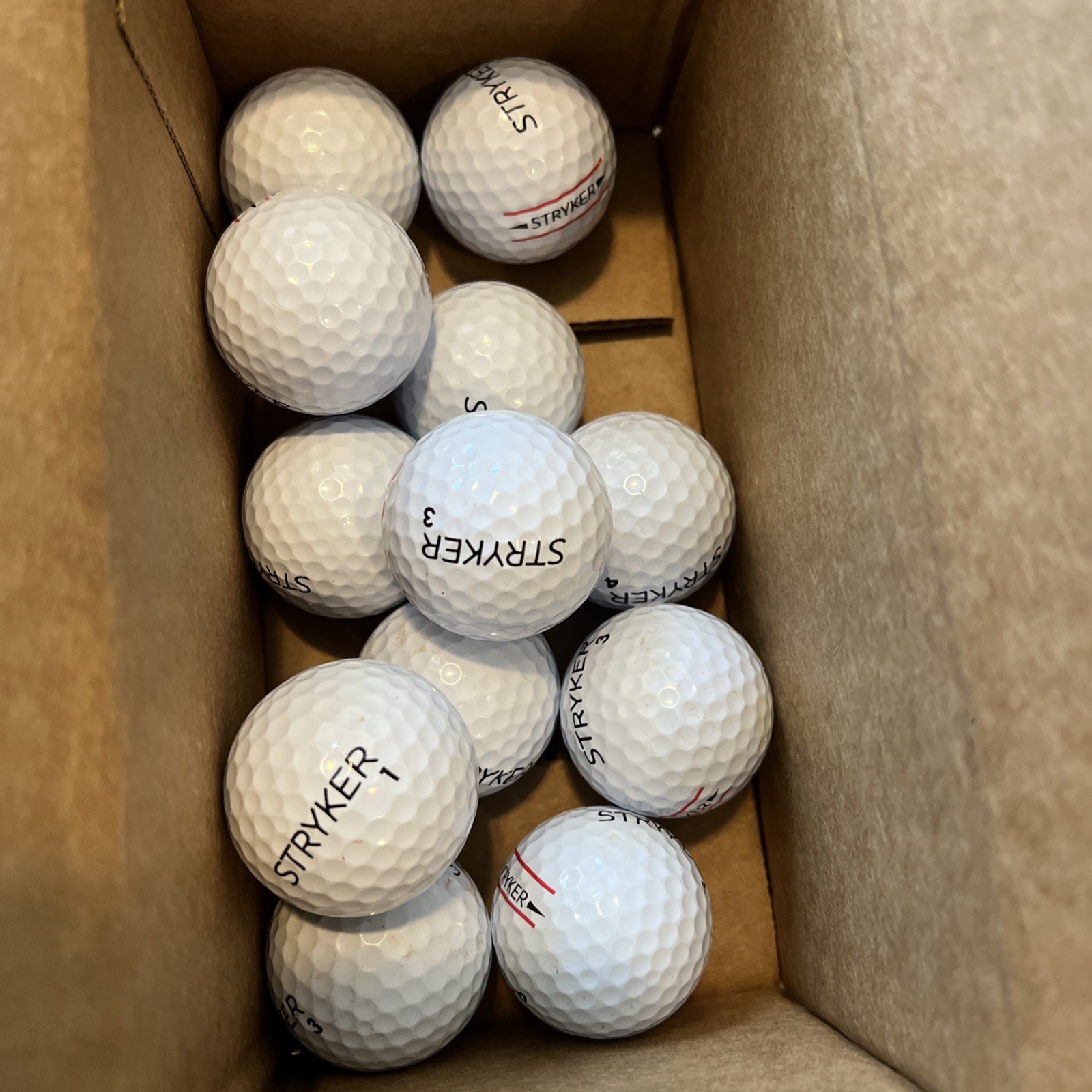 12 STRYKER Golf Balls Great Condition 5A/4B