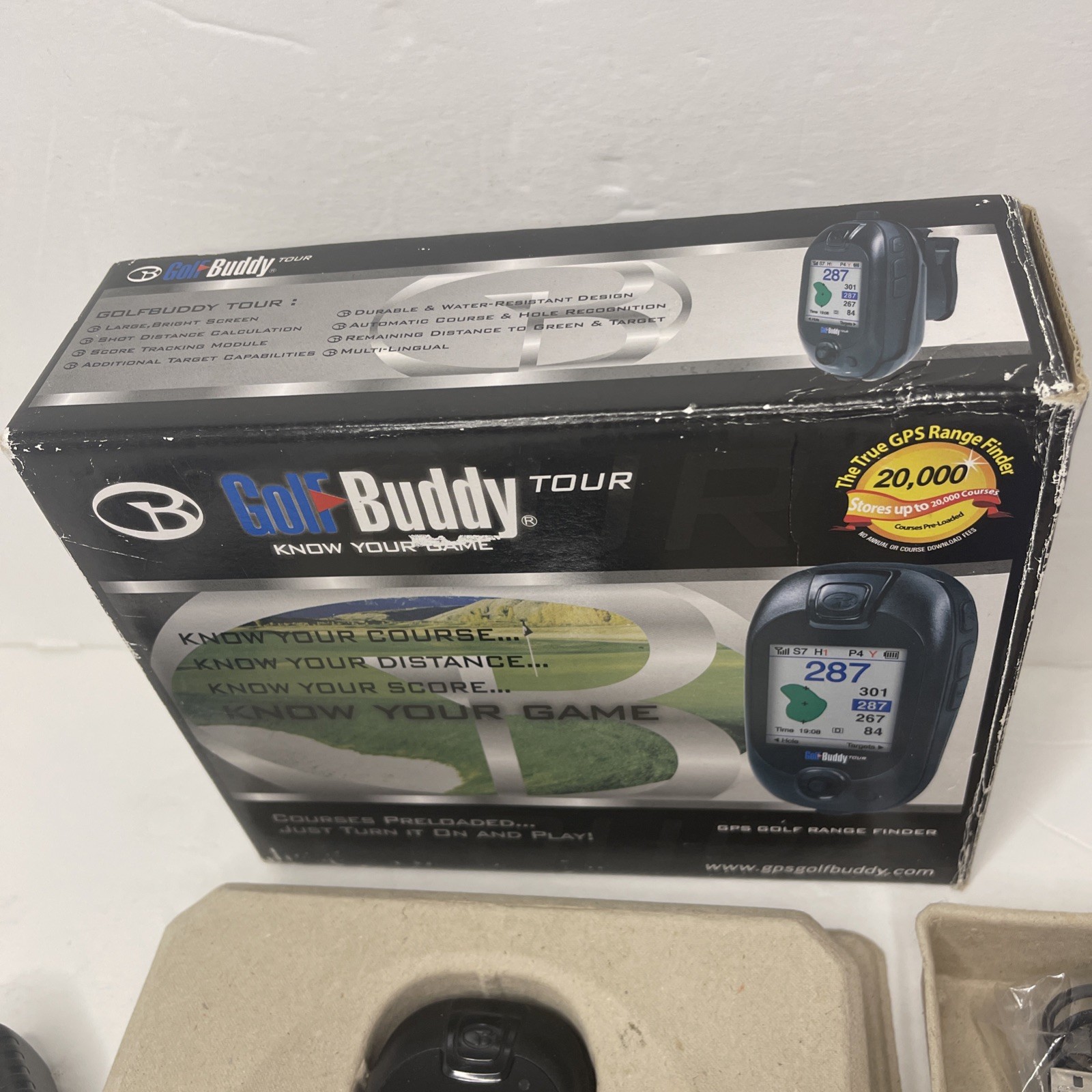 Golf Buddy Tour with Manuals, Belt Clip, Wall Charger, and USB charging cable.