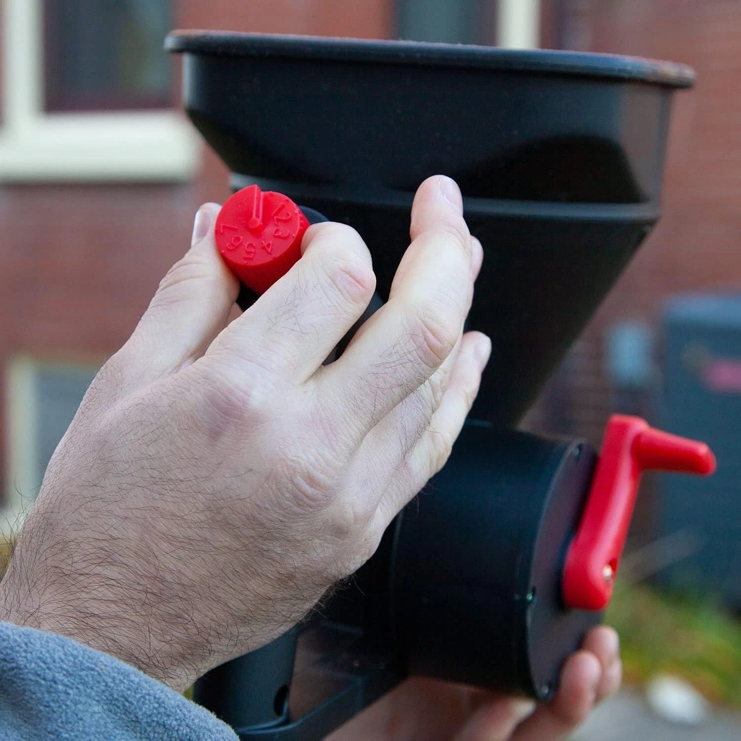 All-Season 5 lb Handheld Spreader with Adjustable Flow for Effortless Spreading