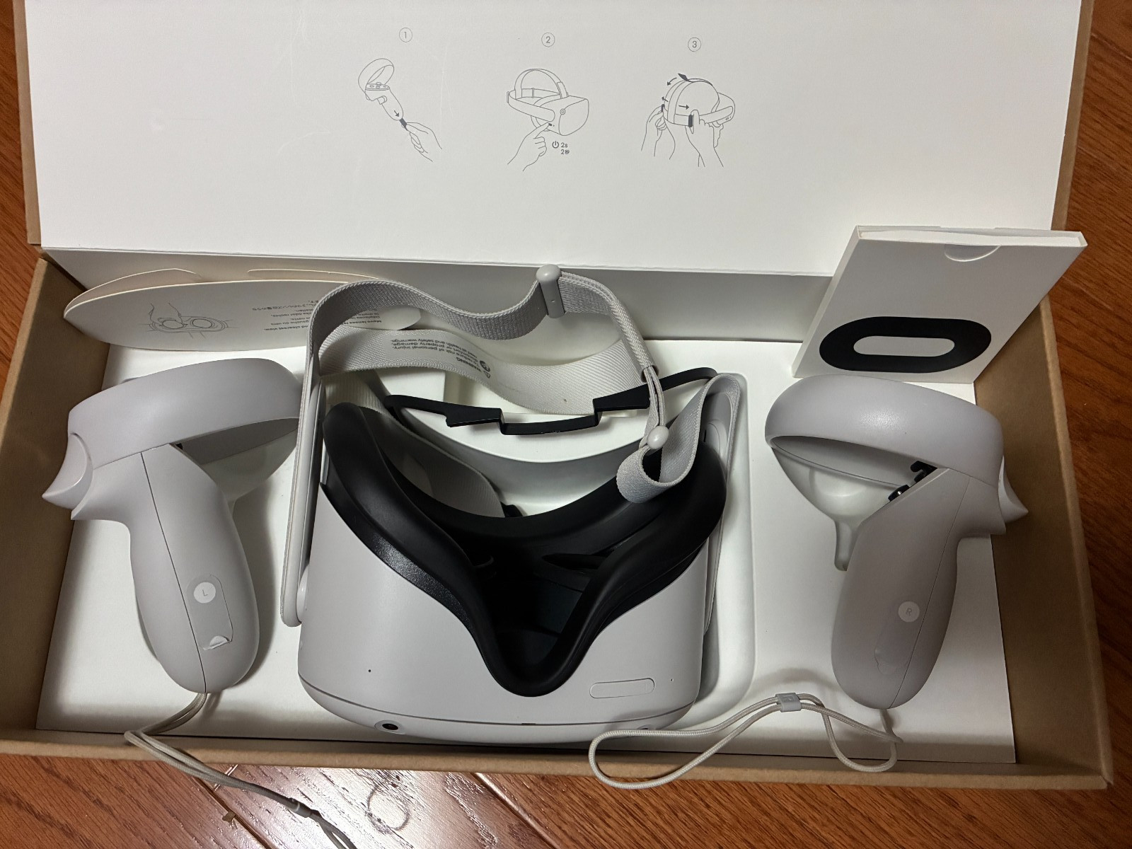 Lightly Used 128GB Meta Quest 2 VR Headset w. Controllers, Elite Strap, Charger