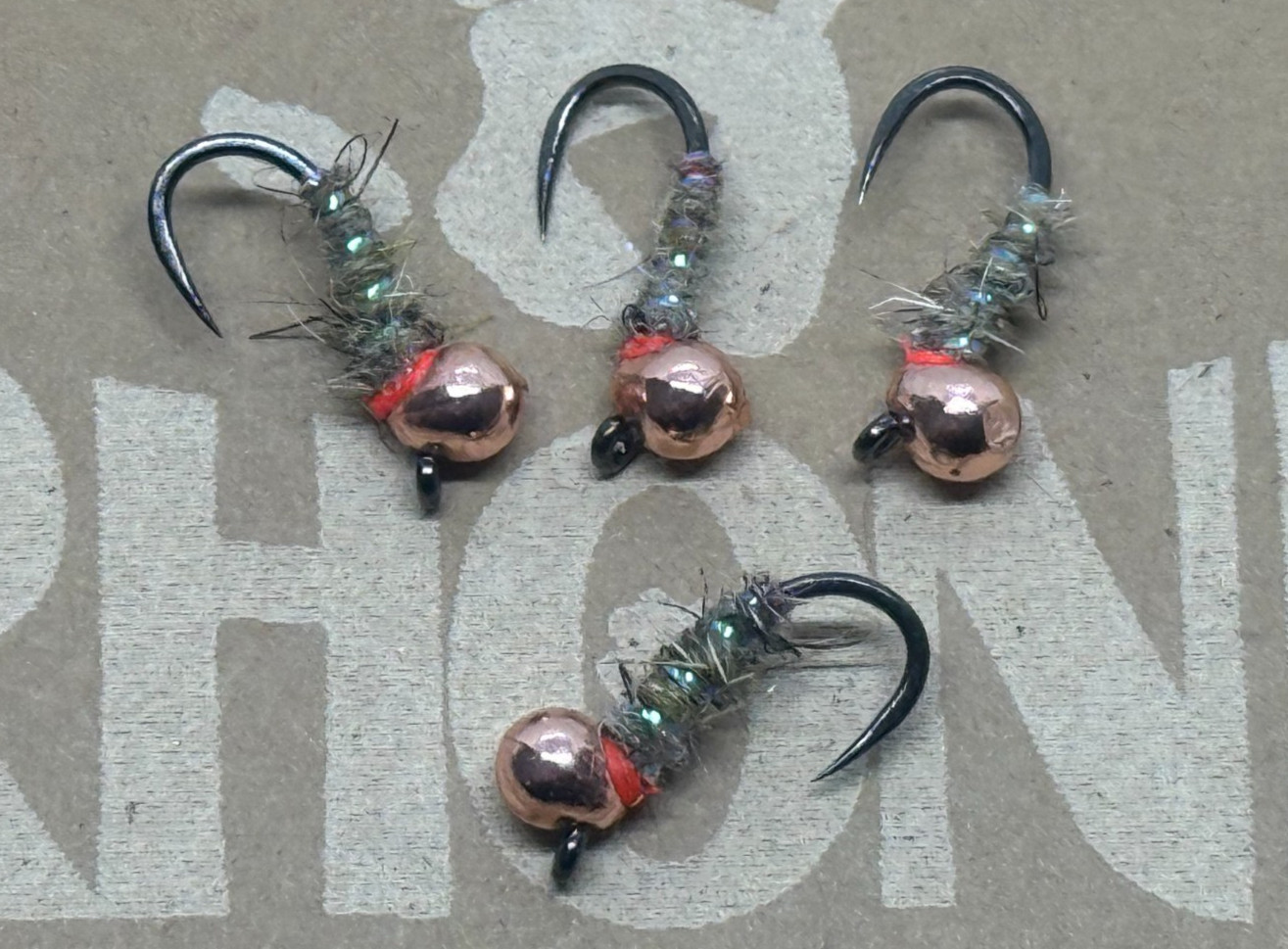 4ea. Offset head Walt's Sexy Worms in Natural size #14. Great Euro nymph.