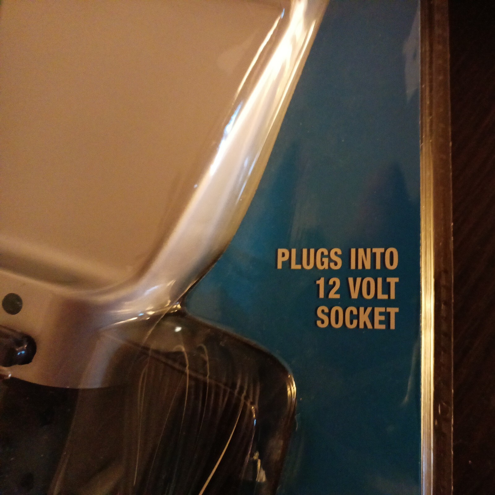 Heated Ice Scraper Rapidly Dislodges Ice Cream Windshield Nip