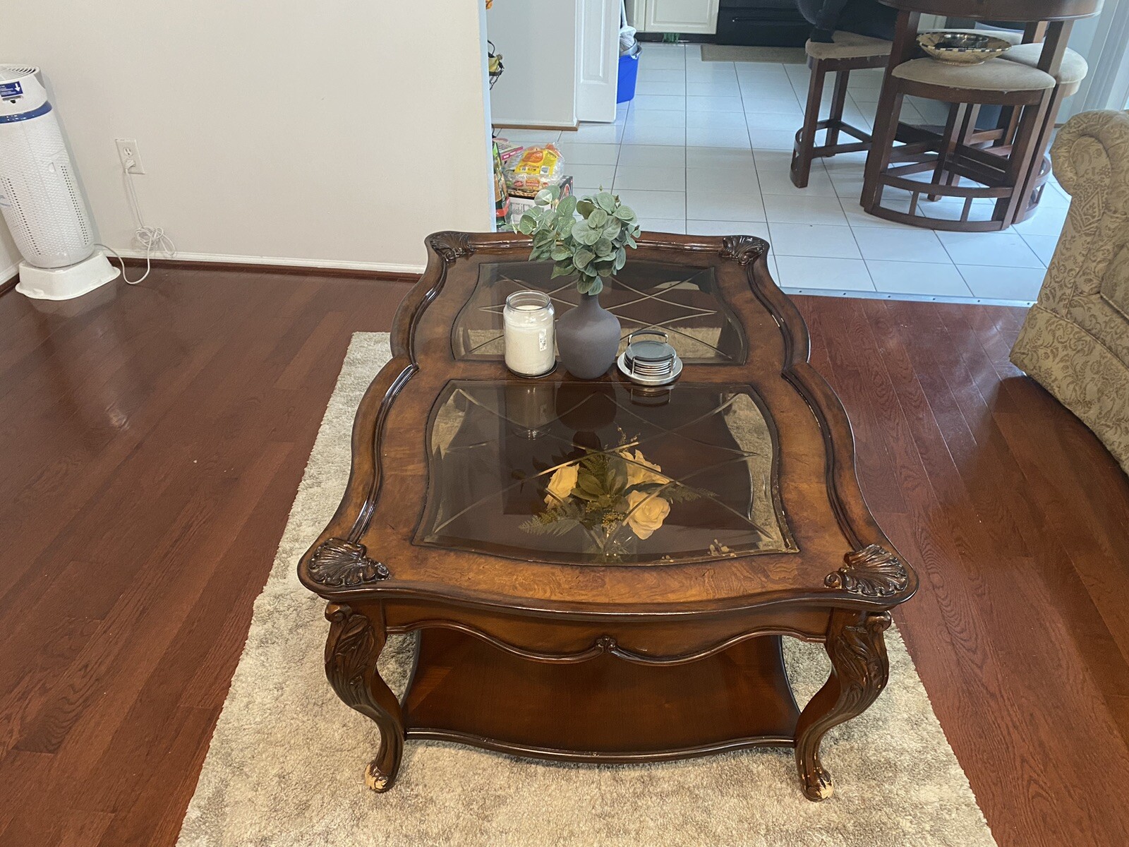 A Set Of Beige Sofas And A Coffee Table
