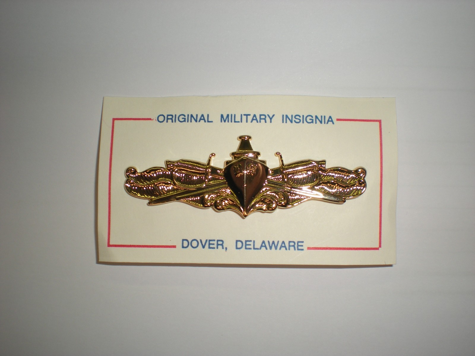 US NAVY SURFACE WARFARE BADGE - ANODIZED GOLD