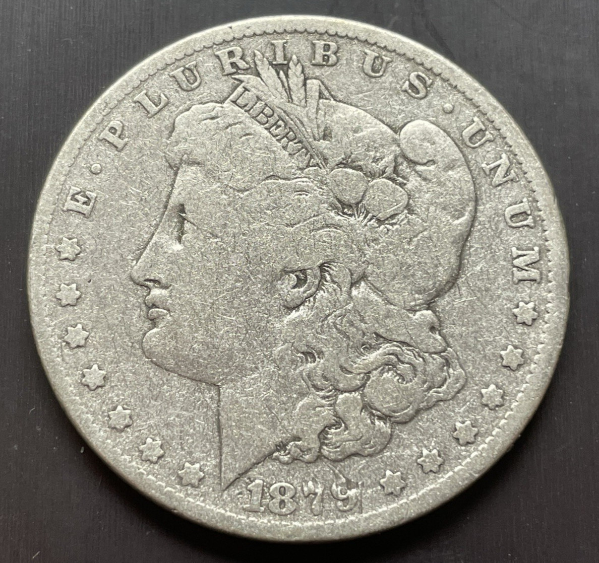 Morgan Silver Dollar 1879 P, Philadelphia Mint, scratch.