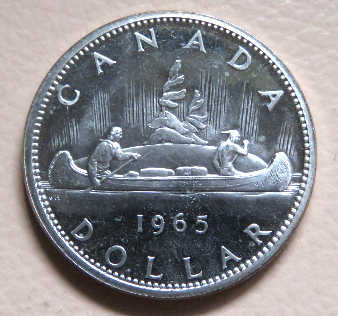 Canada. 1965 Silver - 1 Dollar..  small beads, blunt 5.. Prooflike BU
