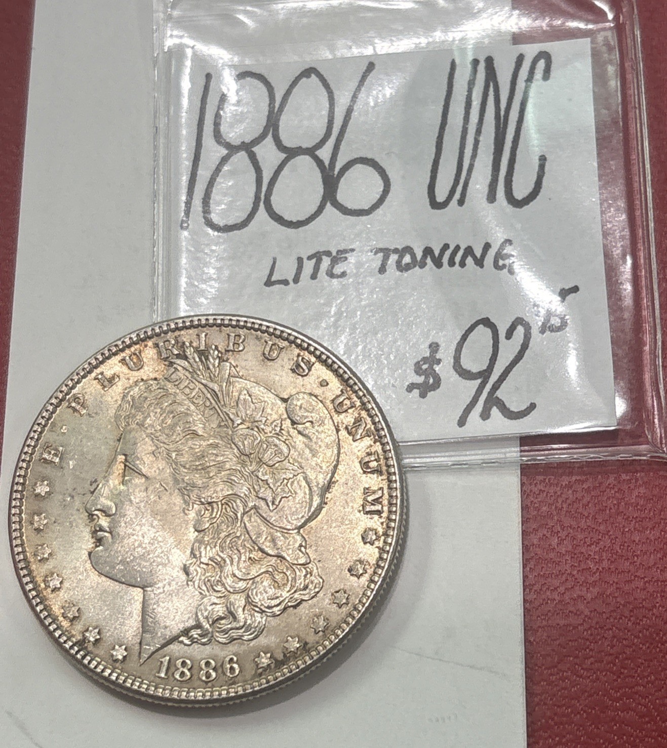 1886 Morgan Silver Dollar (UNC) Uncirculated Cond! Lite Toning! ENN Coins