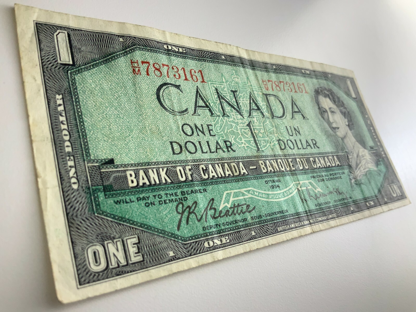 1954 Canada 1 One Dollar Circulated Banknote HM Prefix Beattie Rasminsky Y672