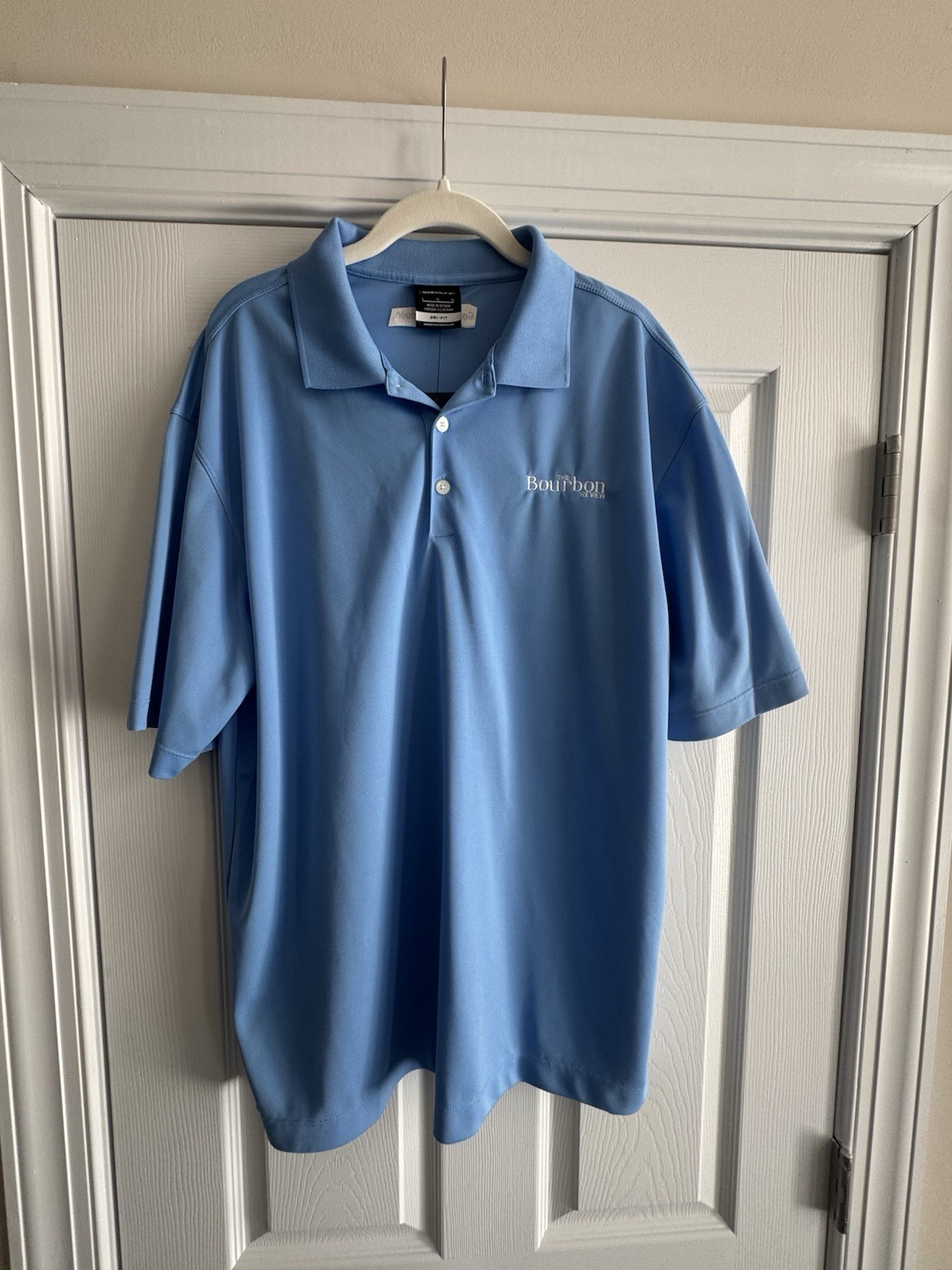 THE BOURBON REVIEW NIKE LARGE LIGHT BLUE POLO SHIRT
