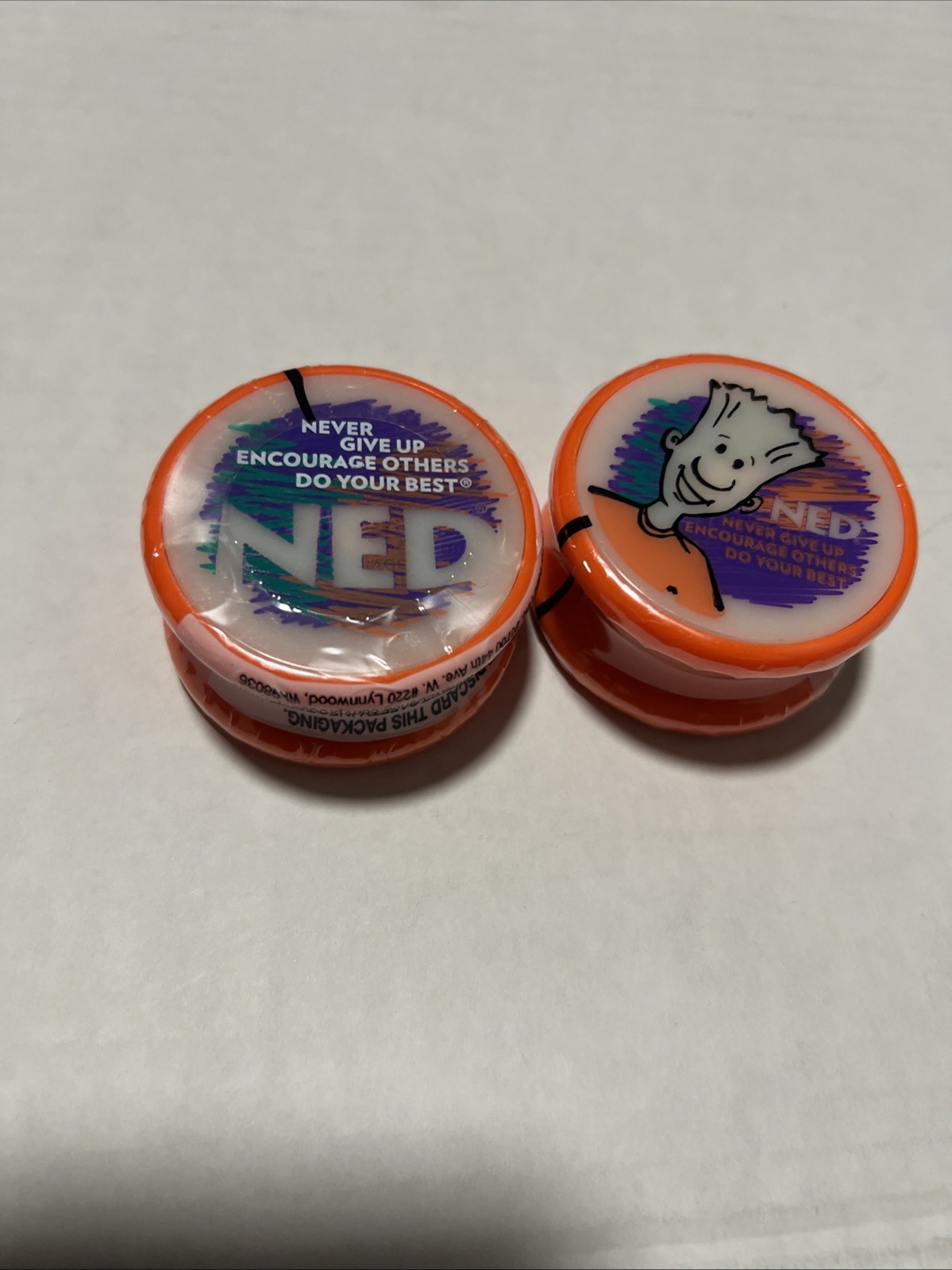 Lot Of 2 Rare NEW Original NED YoYo ORANGE Never Give Up