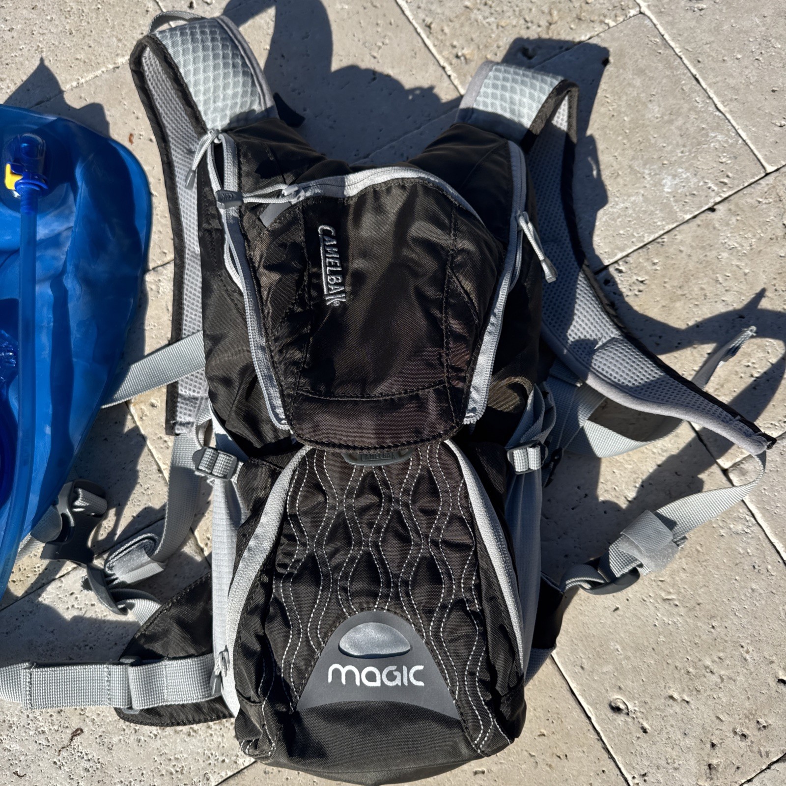 Black CAMELBAK magic Hydration Back Pack w/ Blue 2 Liter/70oz Bladder XV