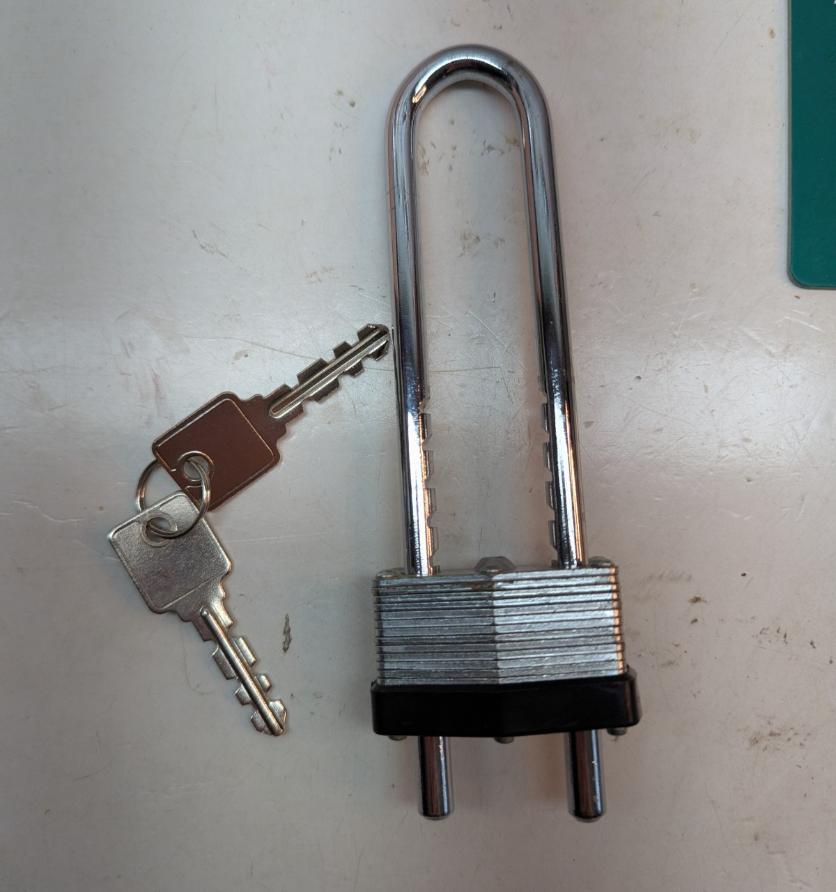 Master Lock Laminated Steel Keyed Padlock with Adjustable Shackle & Keys
