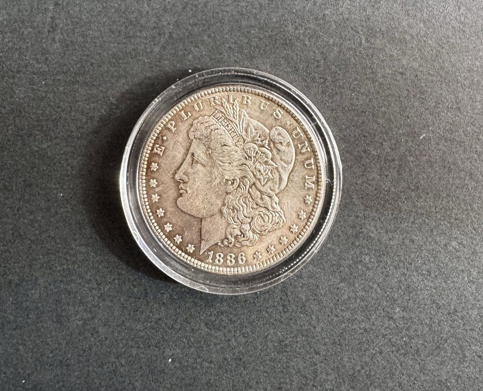 1886 Morgan Silver Dollar – 90% Silver, Encapsulated