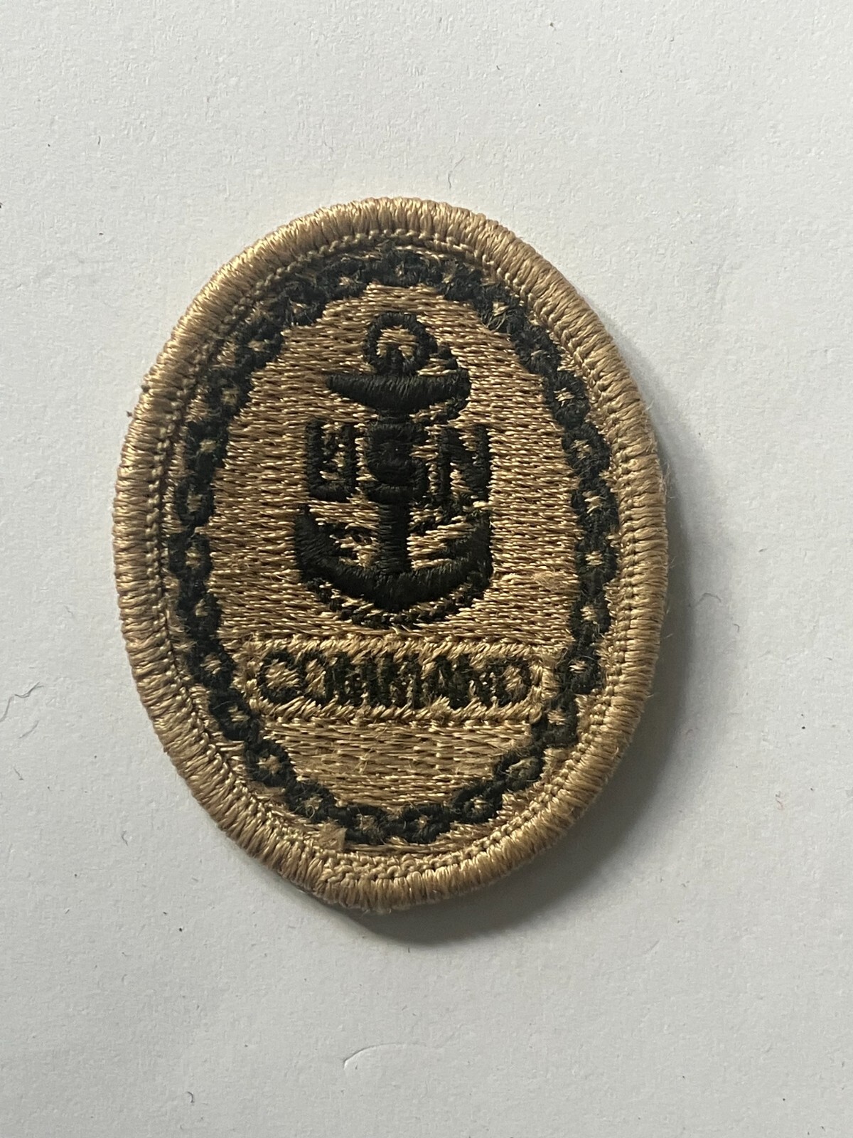 USN Navy Command Chief Petty Officer badge, black on tan cloth