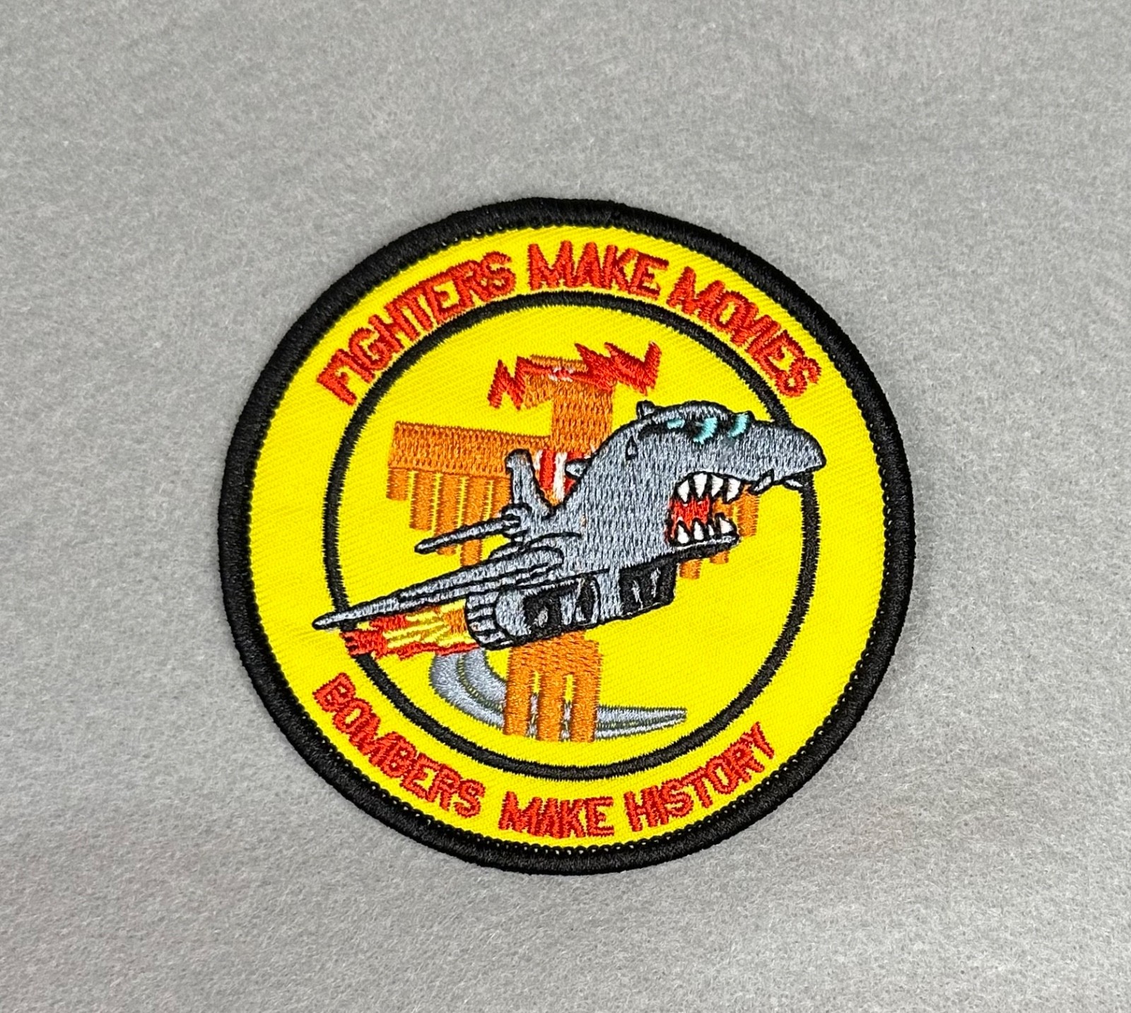 RARE "FIGHTERS MAKE MOVIES BOMBERS MAKE HISTORY" EMBROIDERED IRON PATCH...