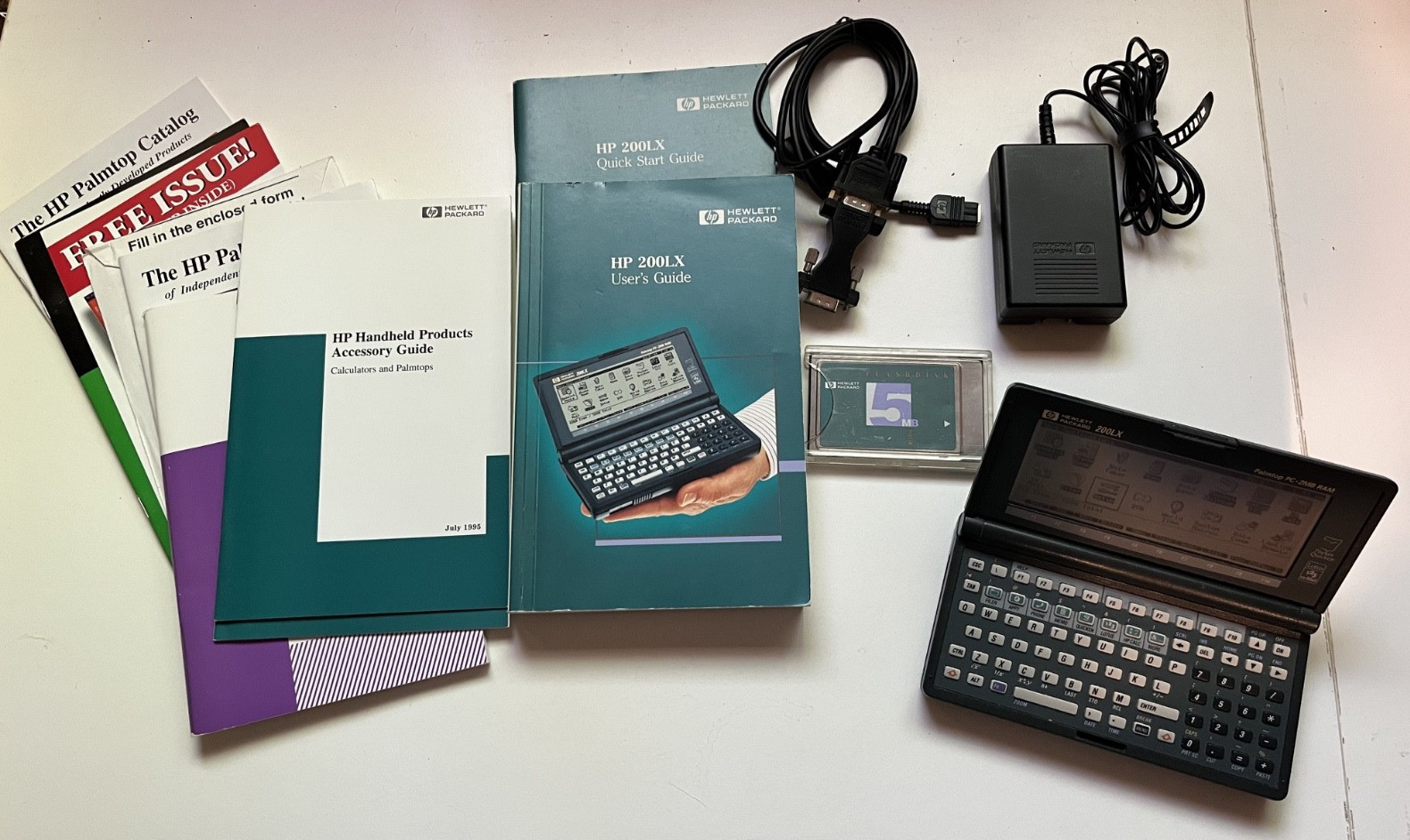 Vintage HP 200LX  Palmtop PC 2MB RAM, 5MB Flash, Data Cable, AC Adapter, Manuals