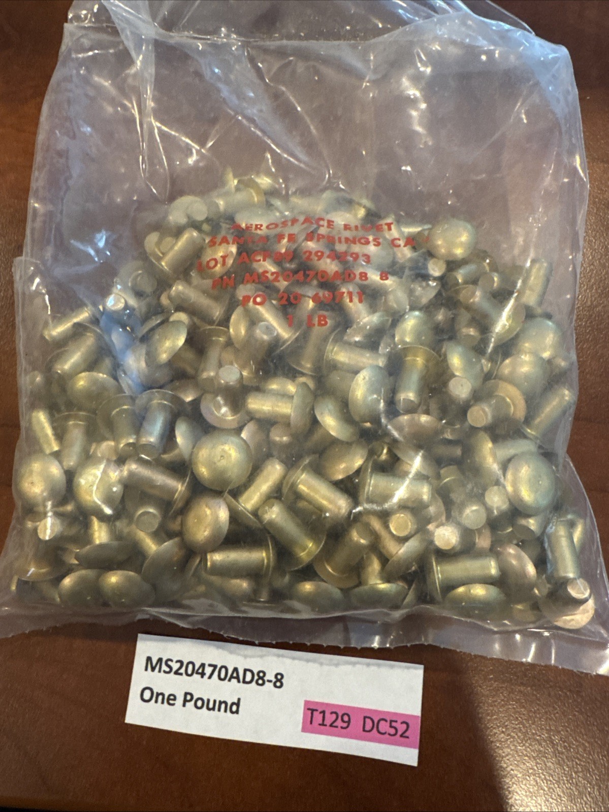 One Pound of  MS20470AD8-8  Solid Rivets.   New.    T129  DC52