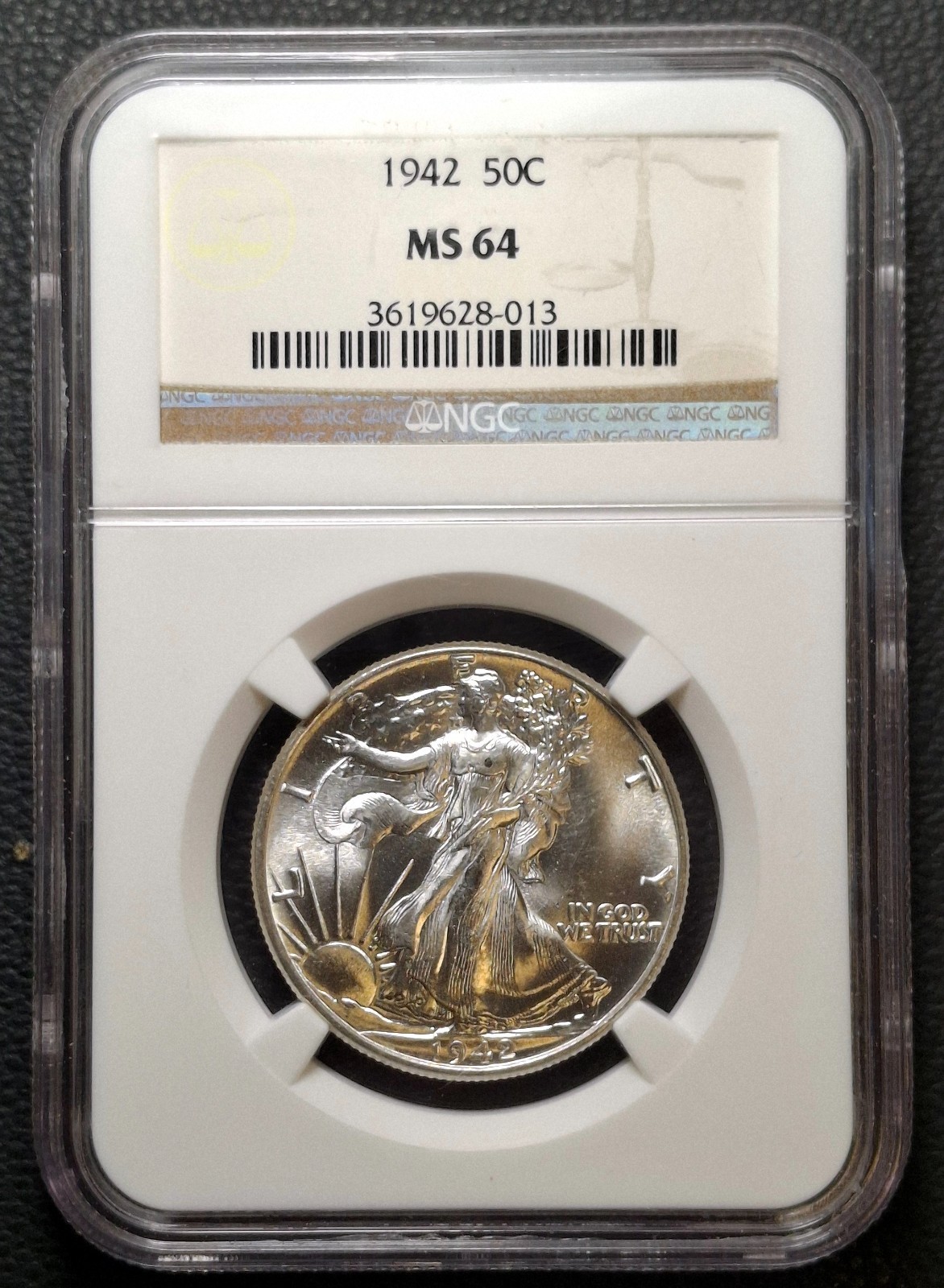 1942 WALKING LIBERTY HALF. NGC CERTIFIED MS64. CERT. #3619628-013