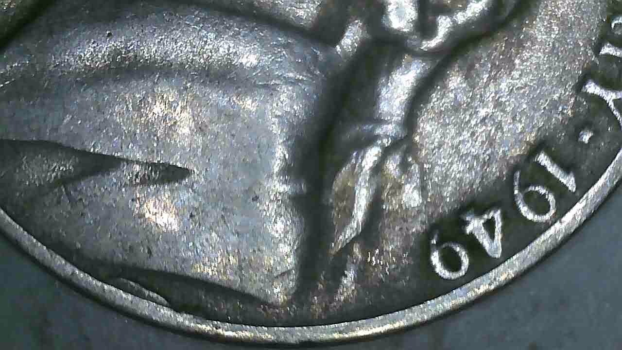 1949 P Nickel with scud error at 6 o clock.