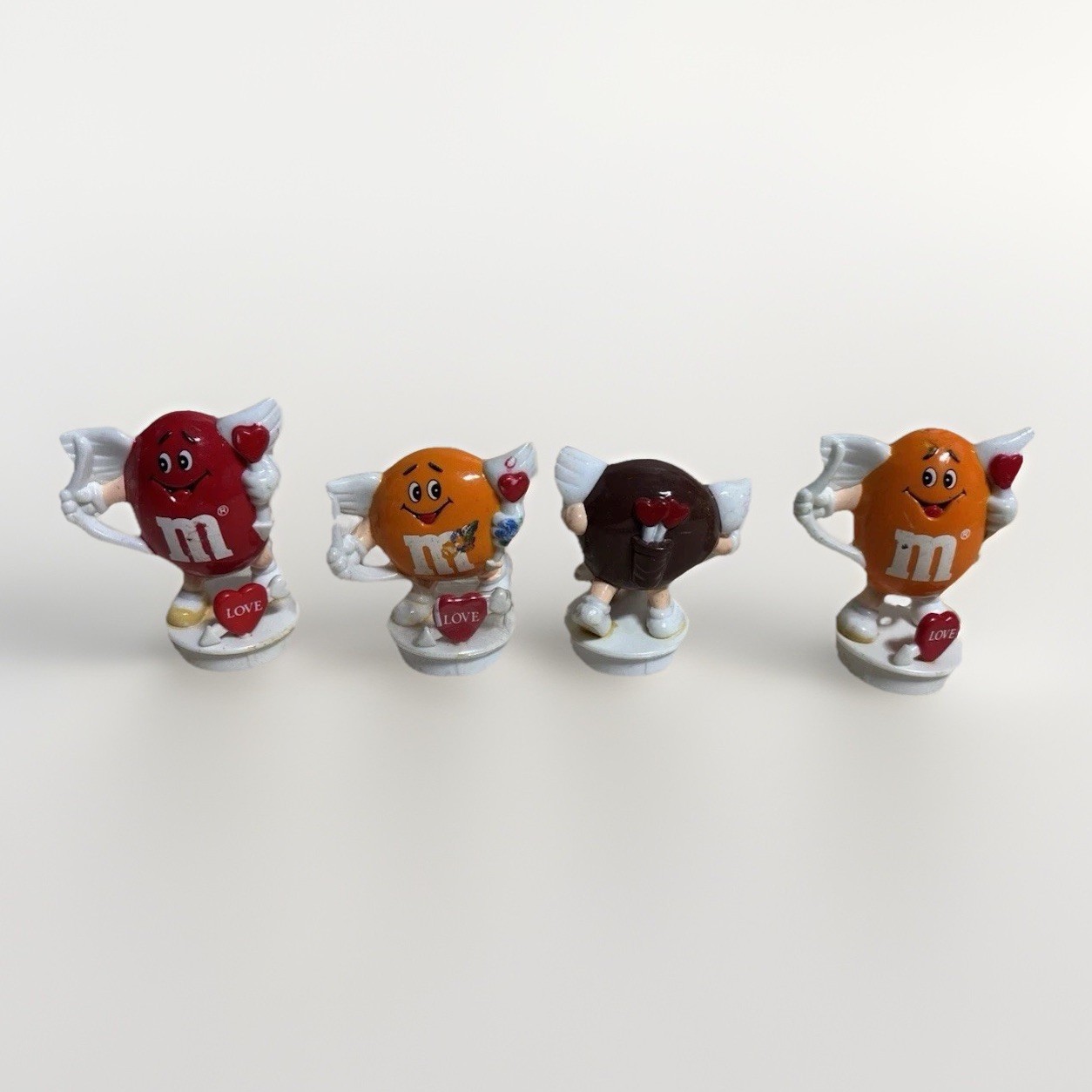 Vintage M&M Cupid Figurines Set of 4 Valentine Mars Candy Red Orange Brown