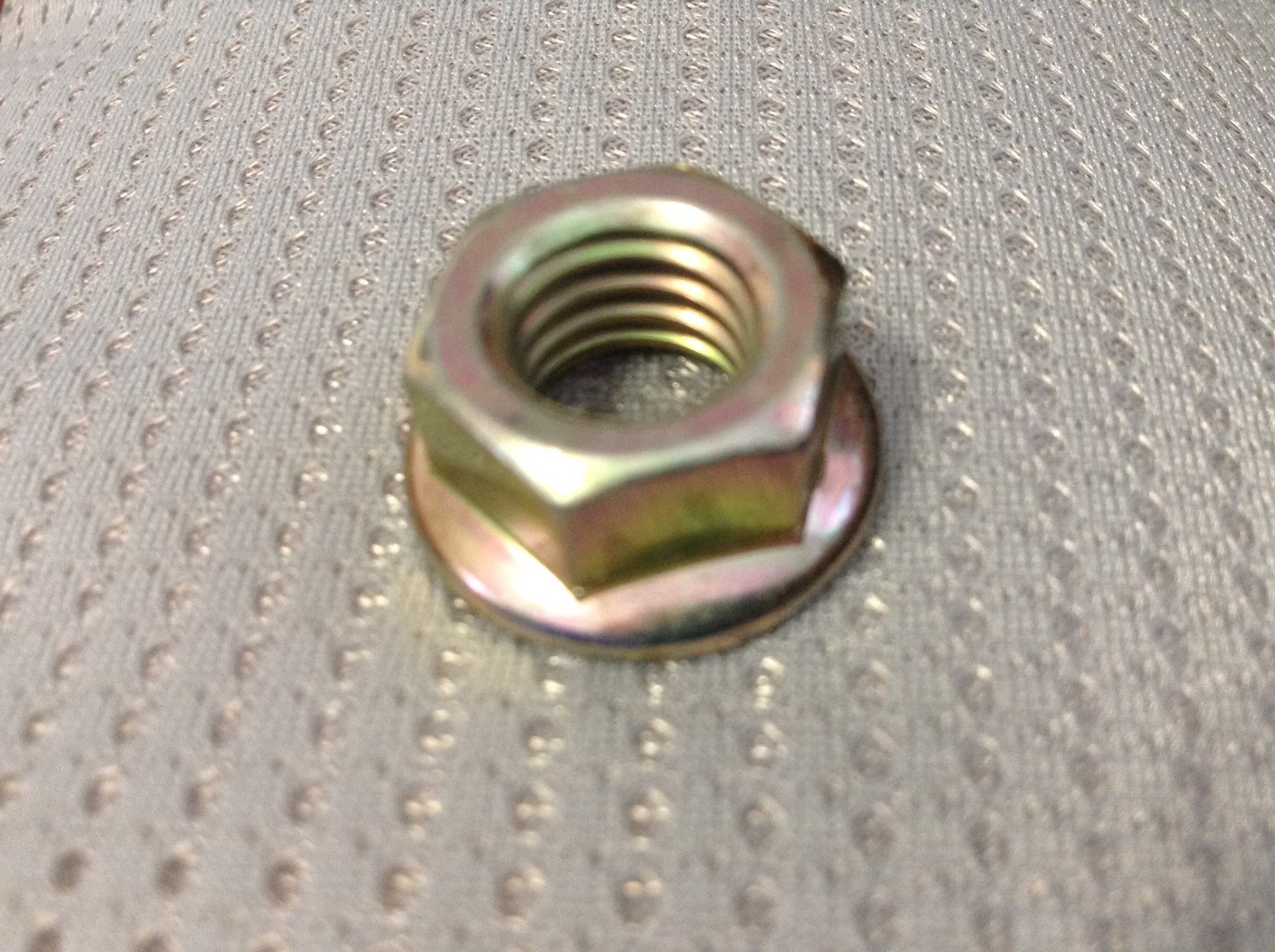 247780 - A New Serrated Flange Nut (3/8-16) For A CaseIH RB455A Round Balers